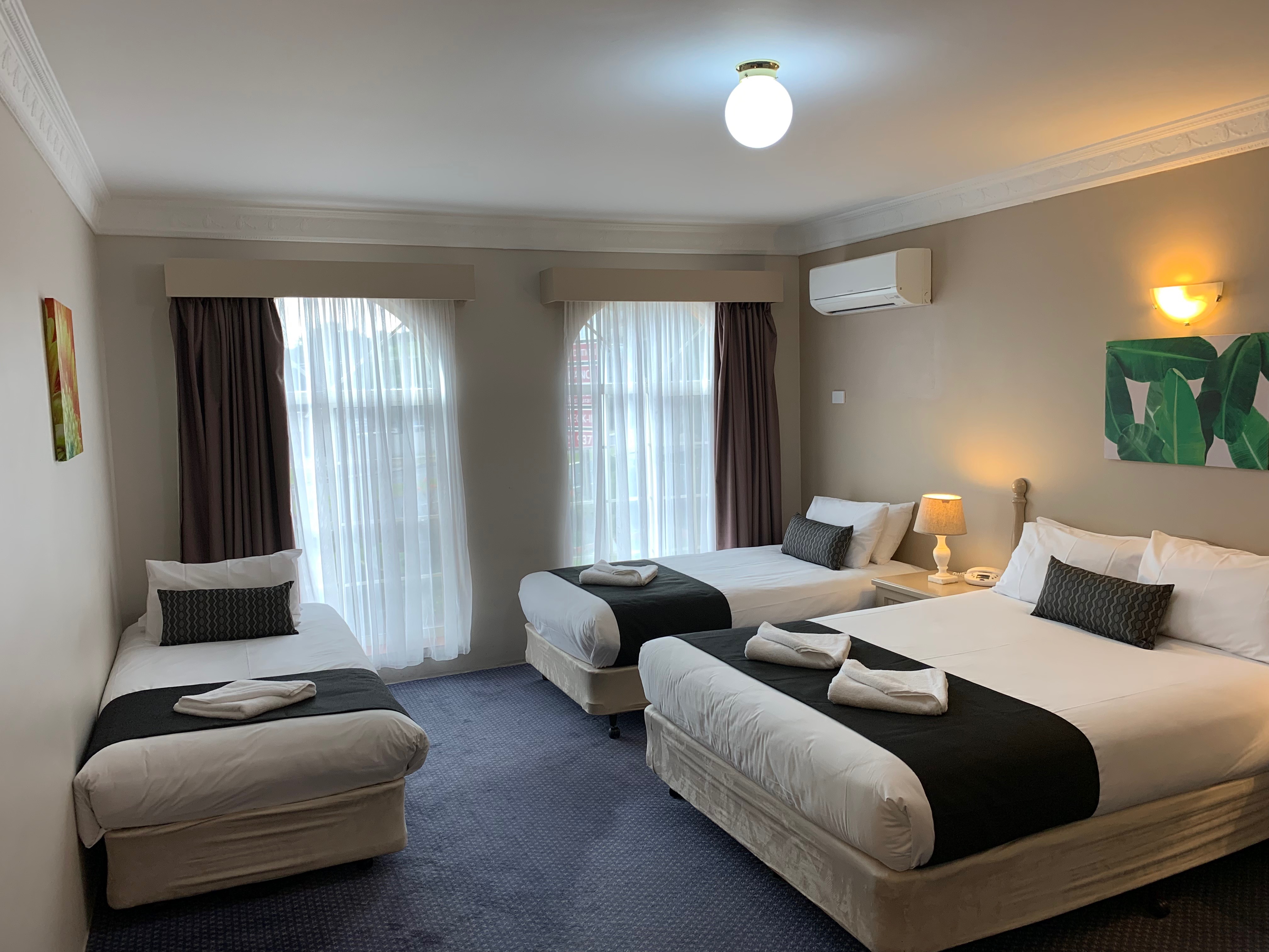 Family Room - One Queen & 2 Single Beds