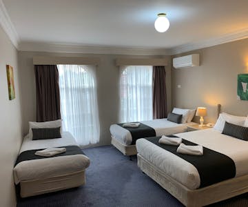 Family Room - One Queen & 2 Single Beds