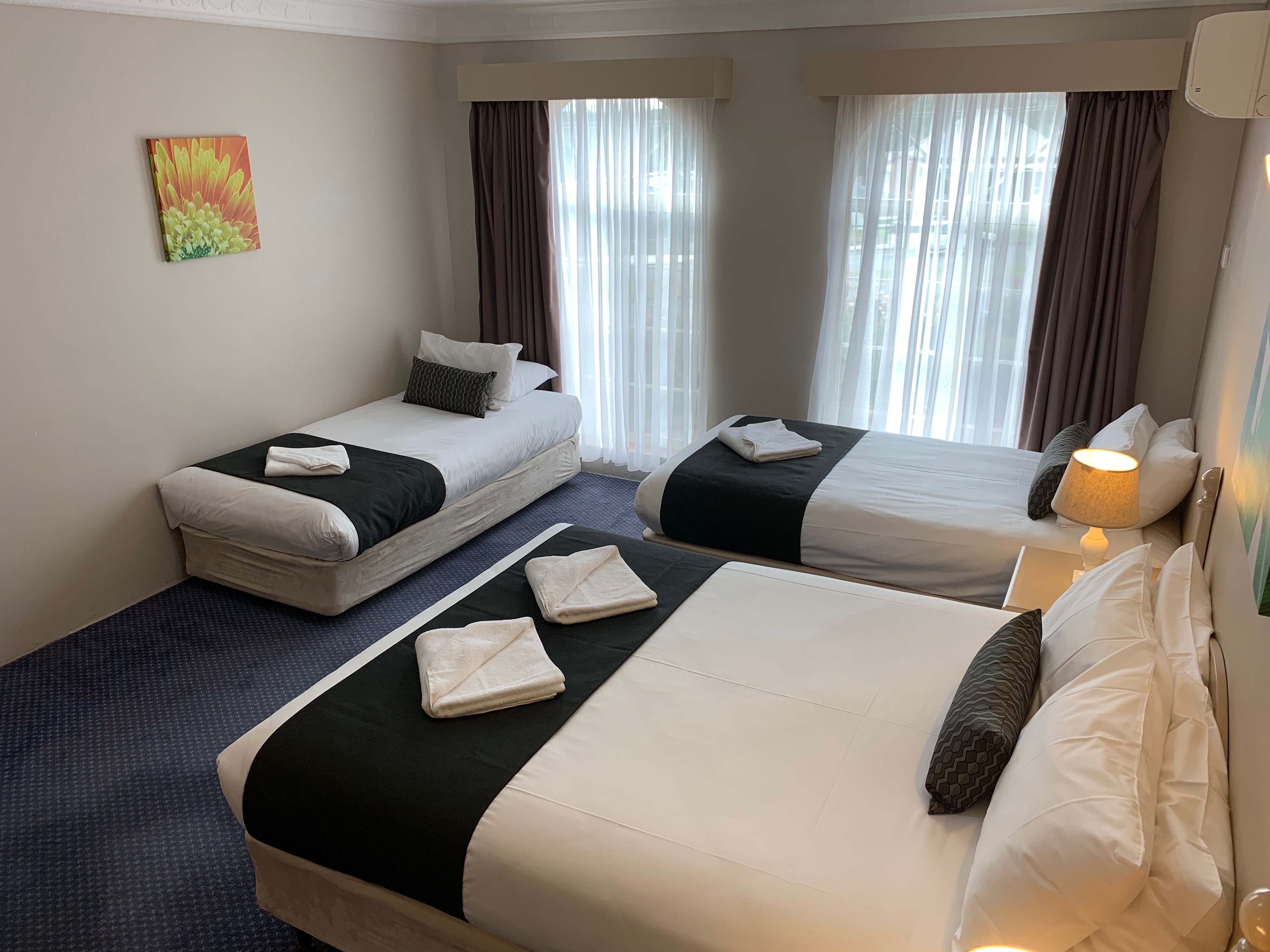 Family Room - One Queen & 2 Single Beds