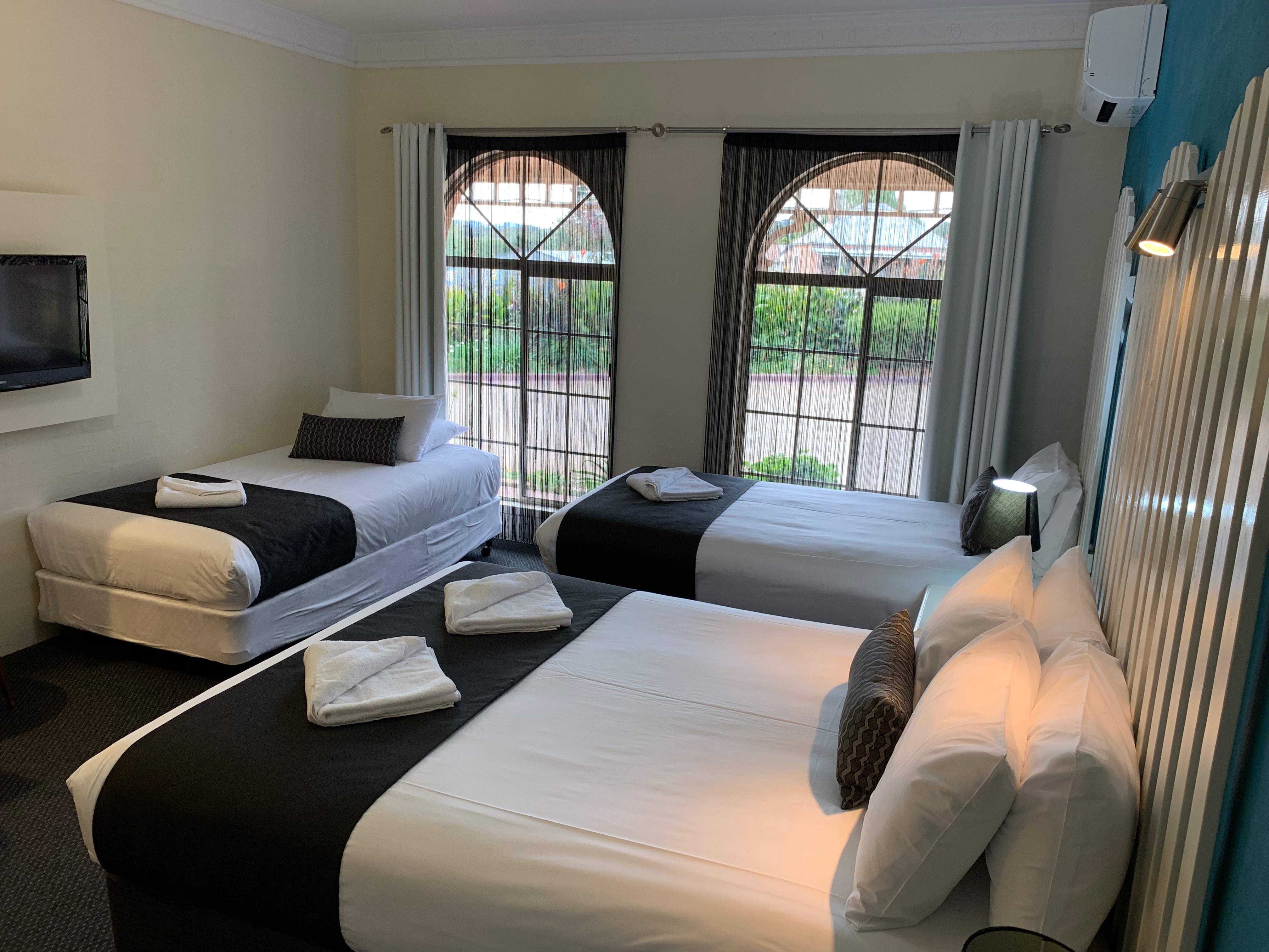 Family Room - One Queen & 2 Single Beds