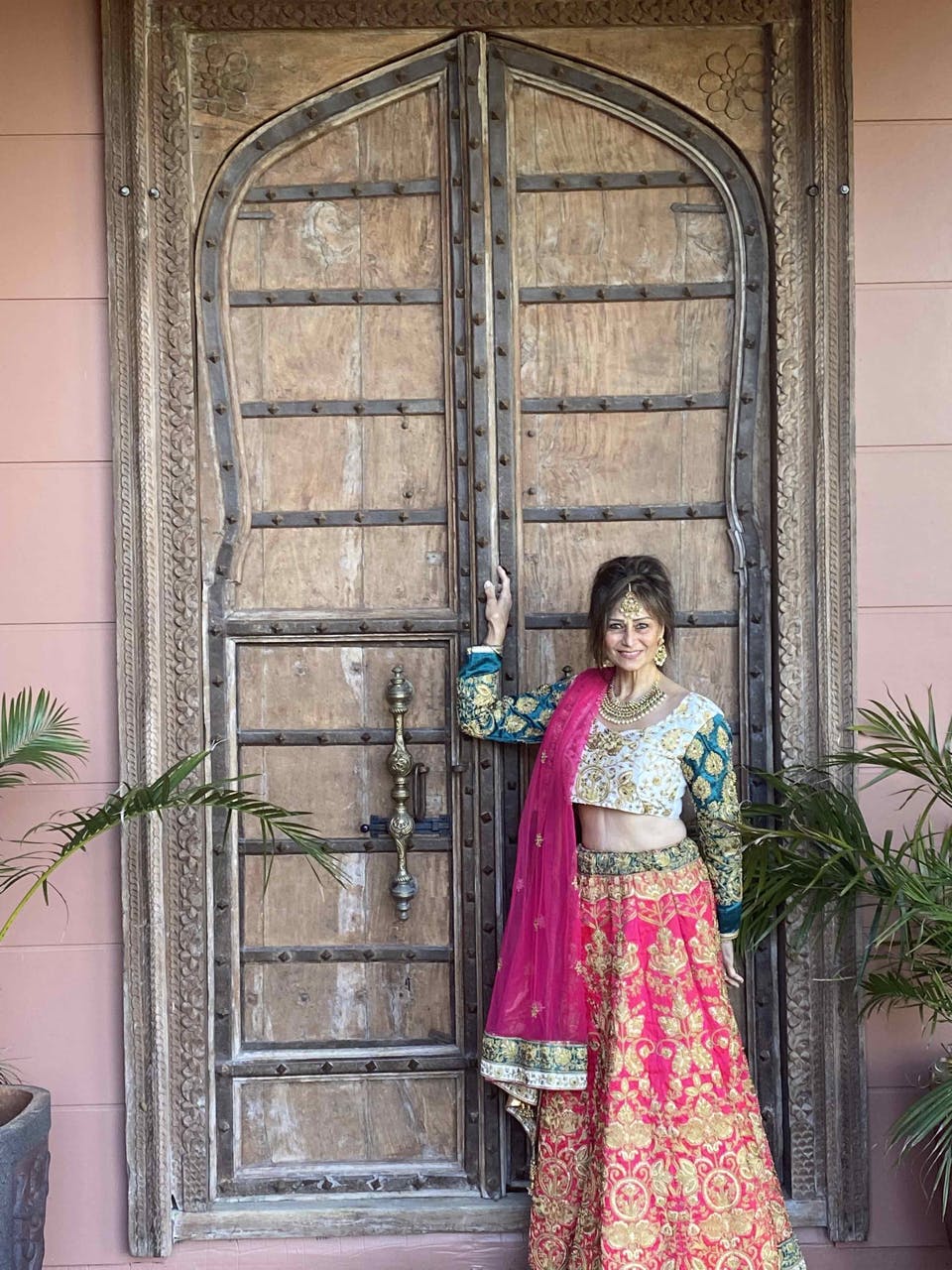 The love of my life for the past 38 years in front of the Lotus Suite haveli door, amazing getaway