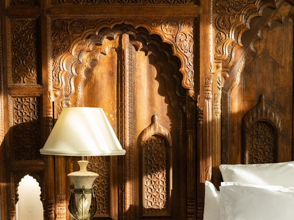 Stunning Jodha Bai Suite 200-300 year old Indian carved temple doors as bedhead in in adults only private retreat