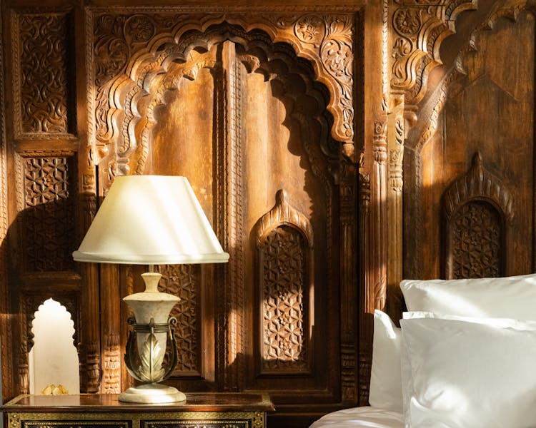 Stunning Jodha Bai Suite 200-300 year old Indian carved temple doors as bedhead in in adults only private retreat
