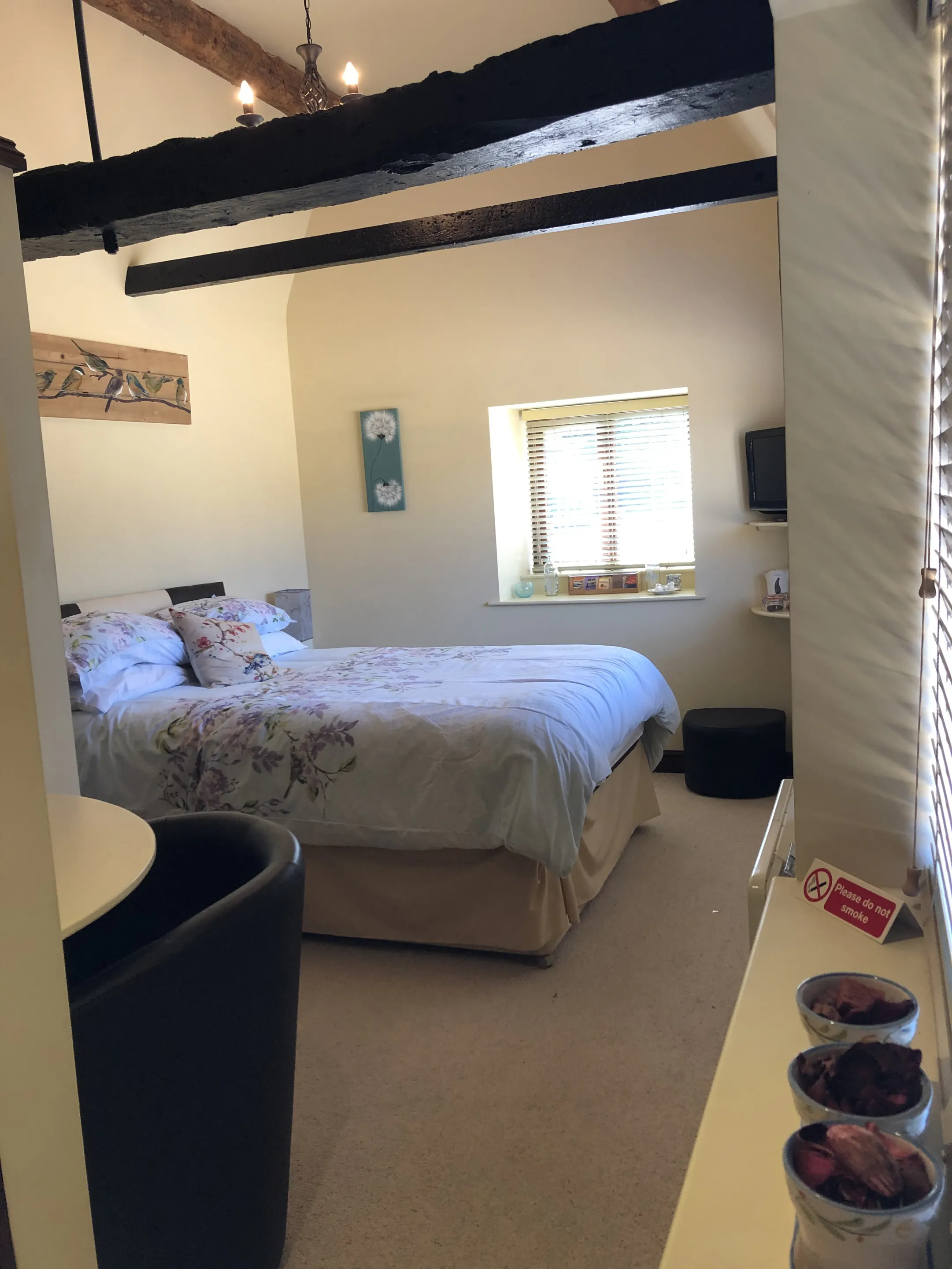 Spacious double bedroom with seating area