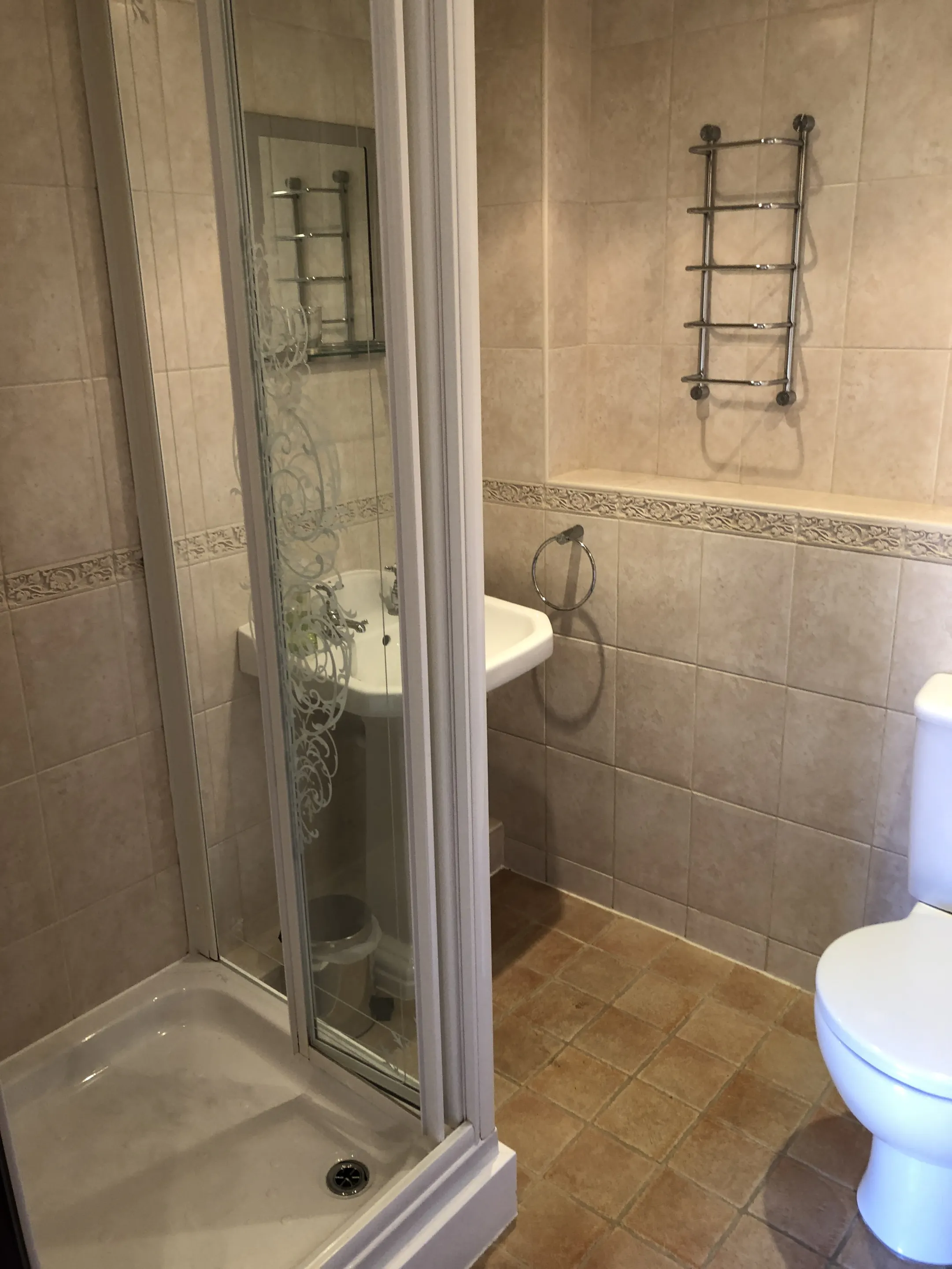 Private en-suite bathroom with shower