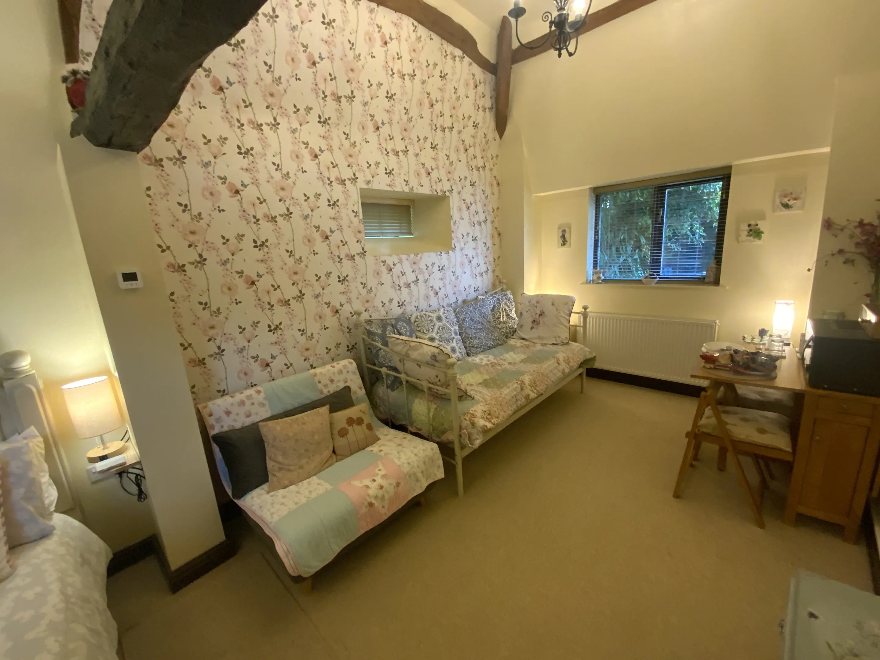 The Smith Family room with Children's beds and eating area