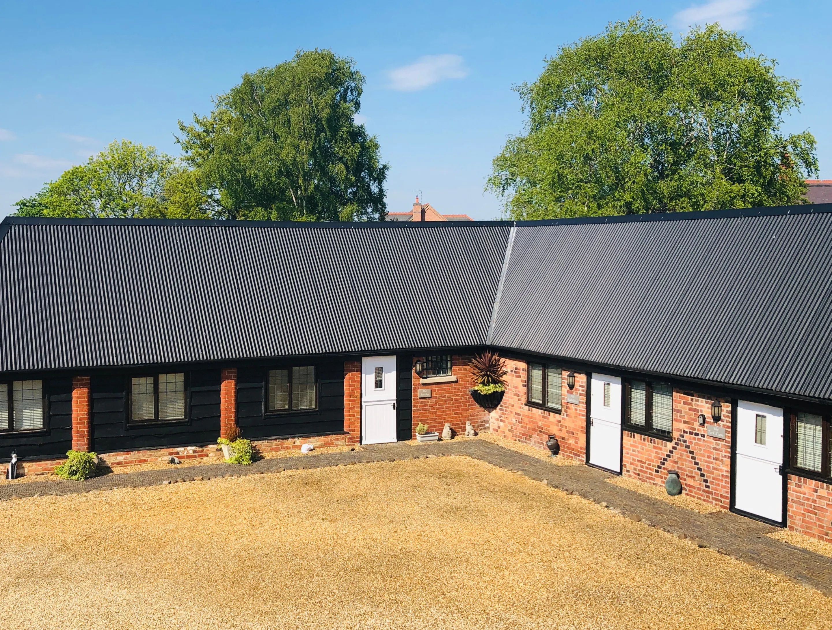 Exterior of Converted stable guest rooms at Hunt House Kilsby