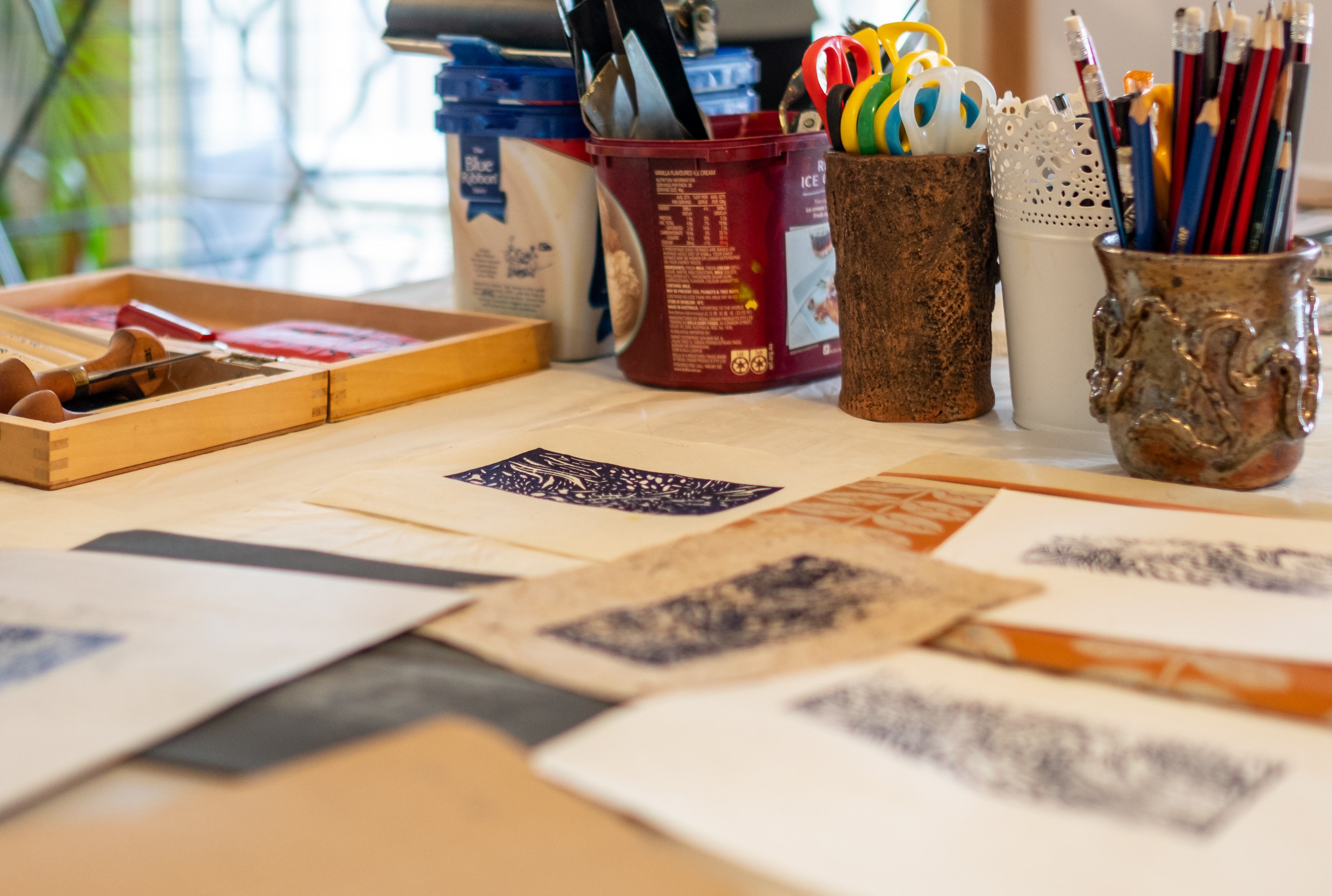 Selection of prints and printing equipment. Image credit: Puddlehub 2024