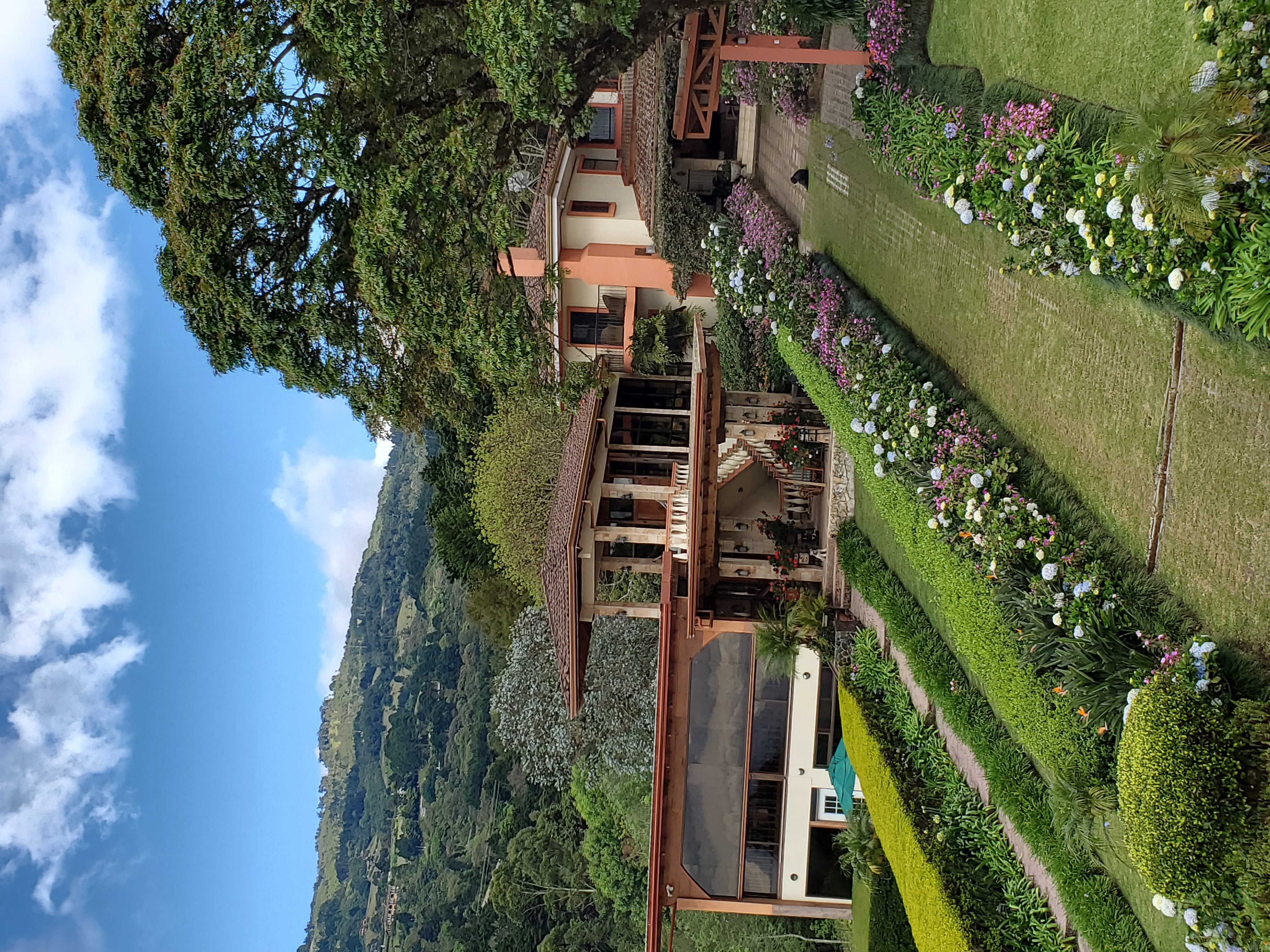 Main Building with breakfast salon, pool and spa, the Antherium and Cala suites