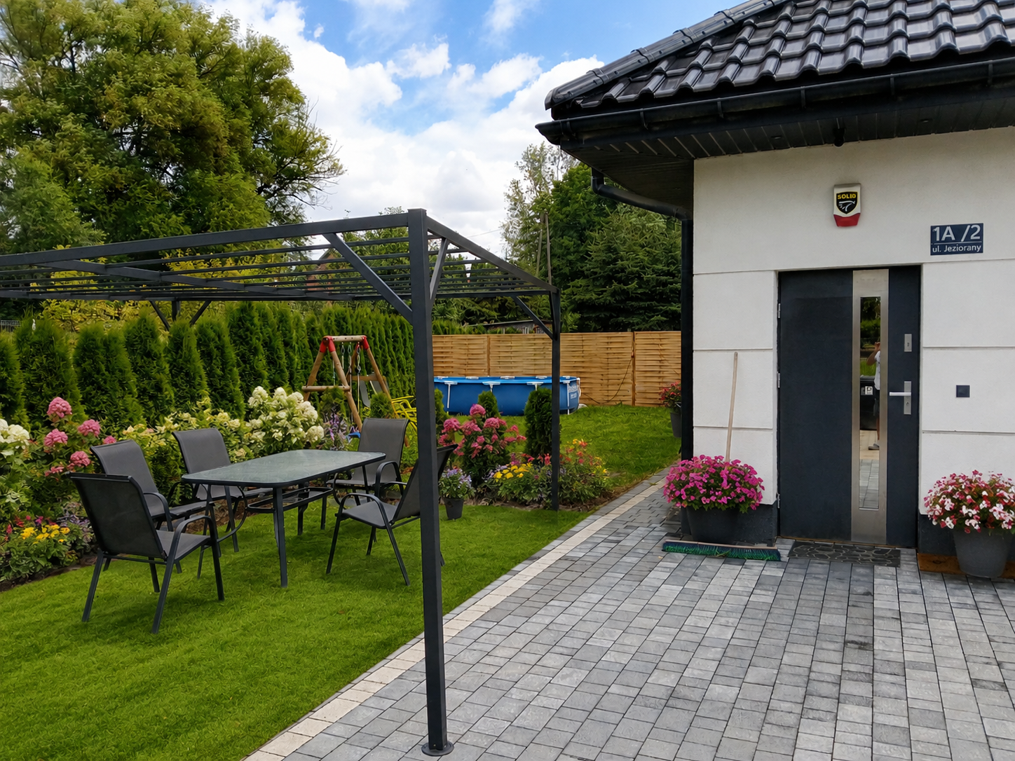 First Floors private parking with private entrance and private garden with pool.