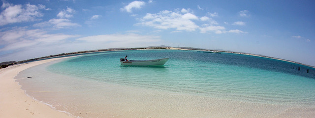 boat on cristal clear sea (carrousel)