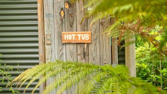 Bush hut hot tub Punakaiki Greymouth accommodation