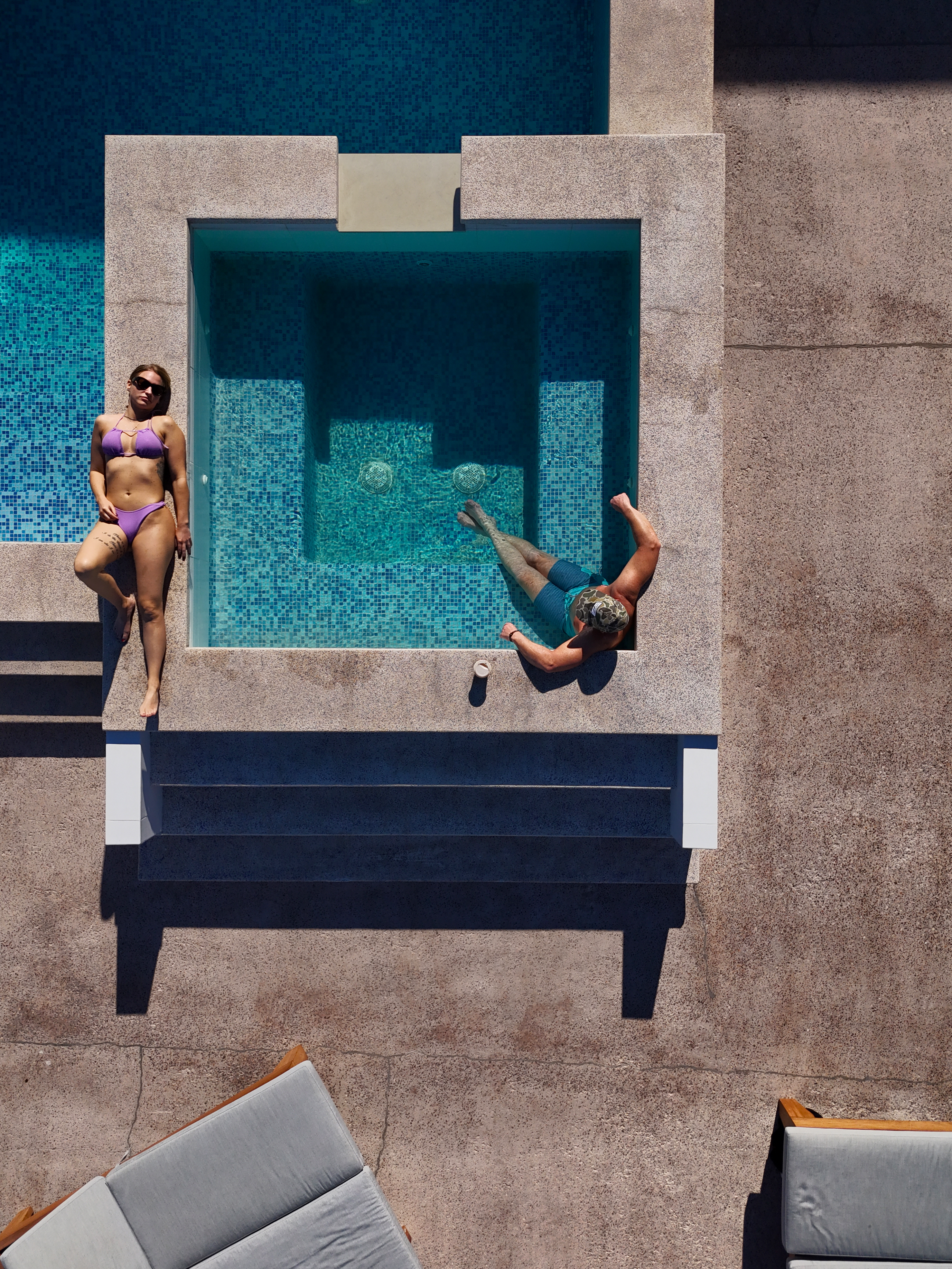 people in rooftop pool and spa at Aventuras Hotel in Loreto Bay Baja