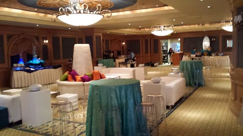 A wide view of a luxurious meeting room with modern furniture and elegant decor.