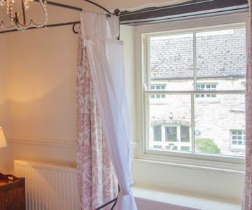Four poster bed at The Wensleydale Hotel, Middleham, offers boutique accommodation in the heart of the Yorkshire Dales