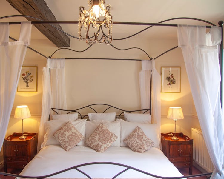 Four poster bed at The Wensleydale Hotel, Middleham, offers boutique accommodation in the heart of the Yorkshire Dales