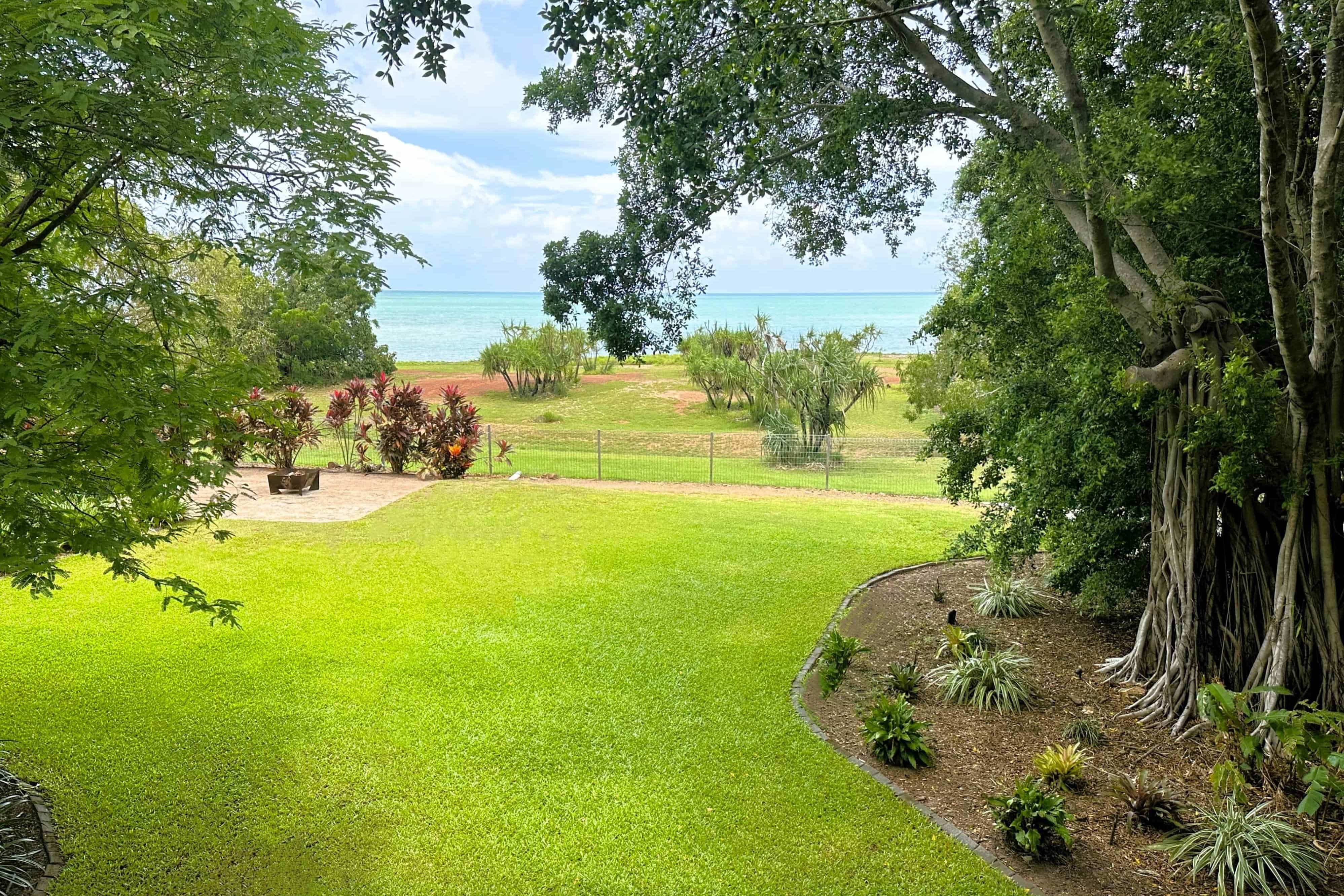 Beachfront Firepit on the Green Lawn with Sea Views