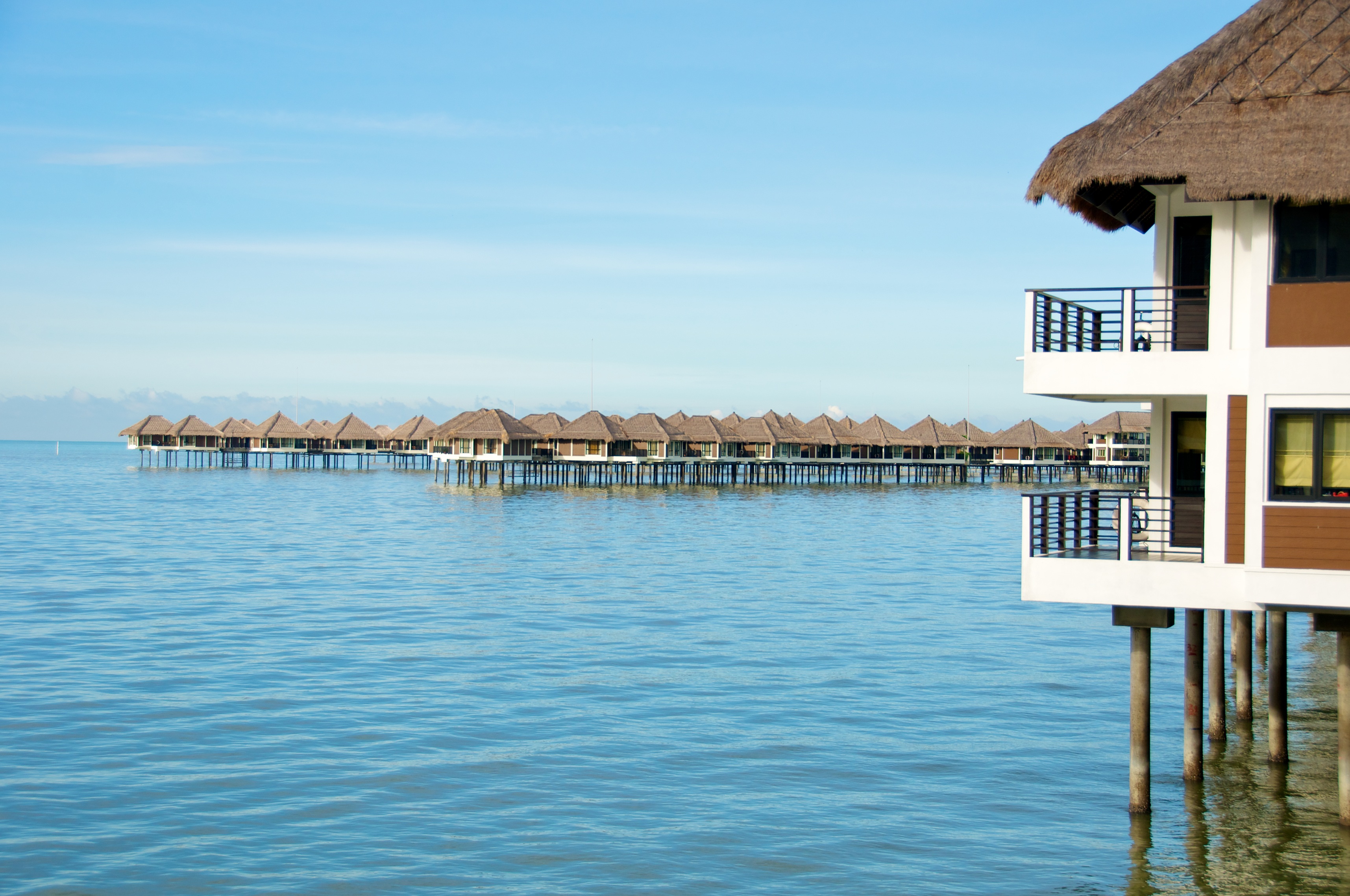 golden_palm_tree_overwater_villa