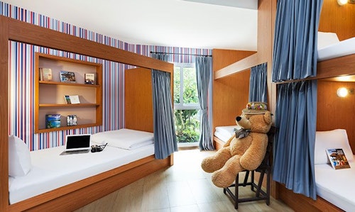 Family and Friends room with four bunk beds and garden views