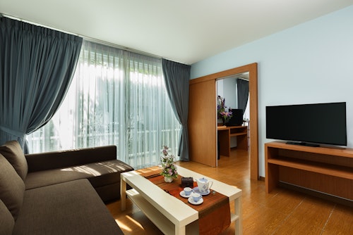 Silk Suite room with separate living area and natural light