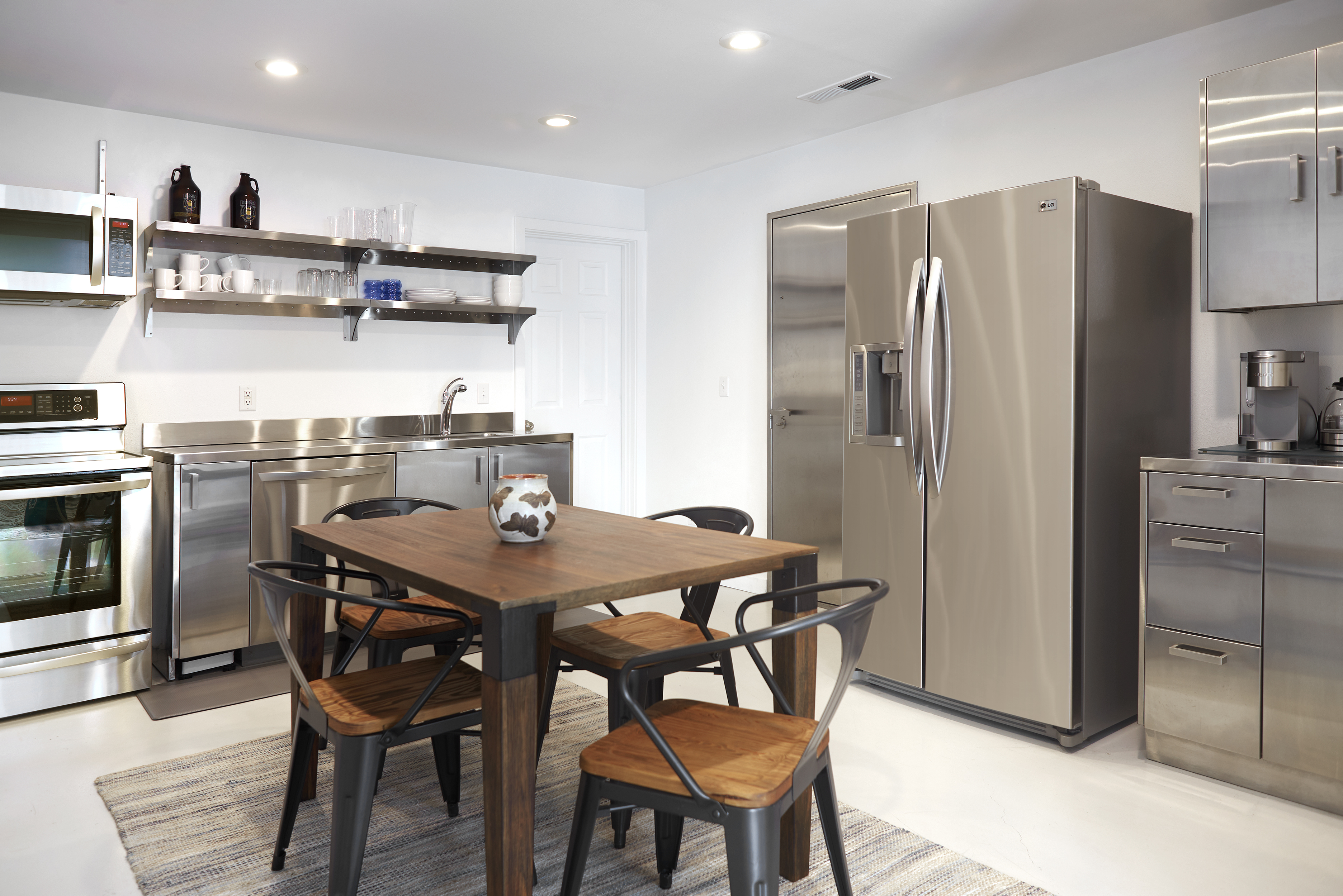 Two queen beds, attached bathroom, full kitchen.