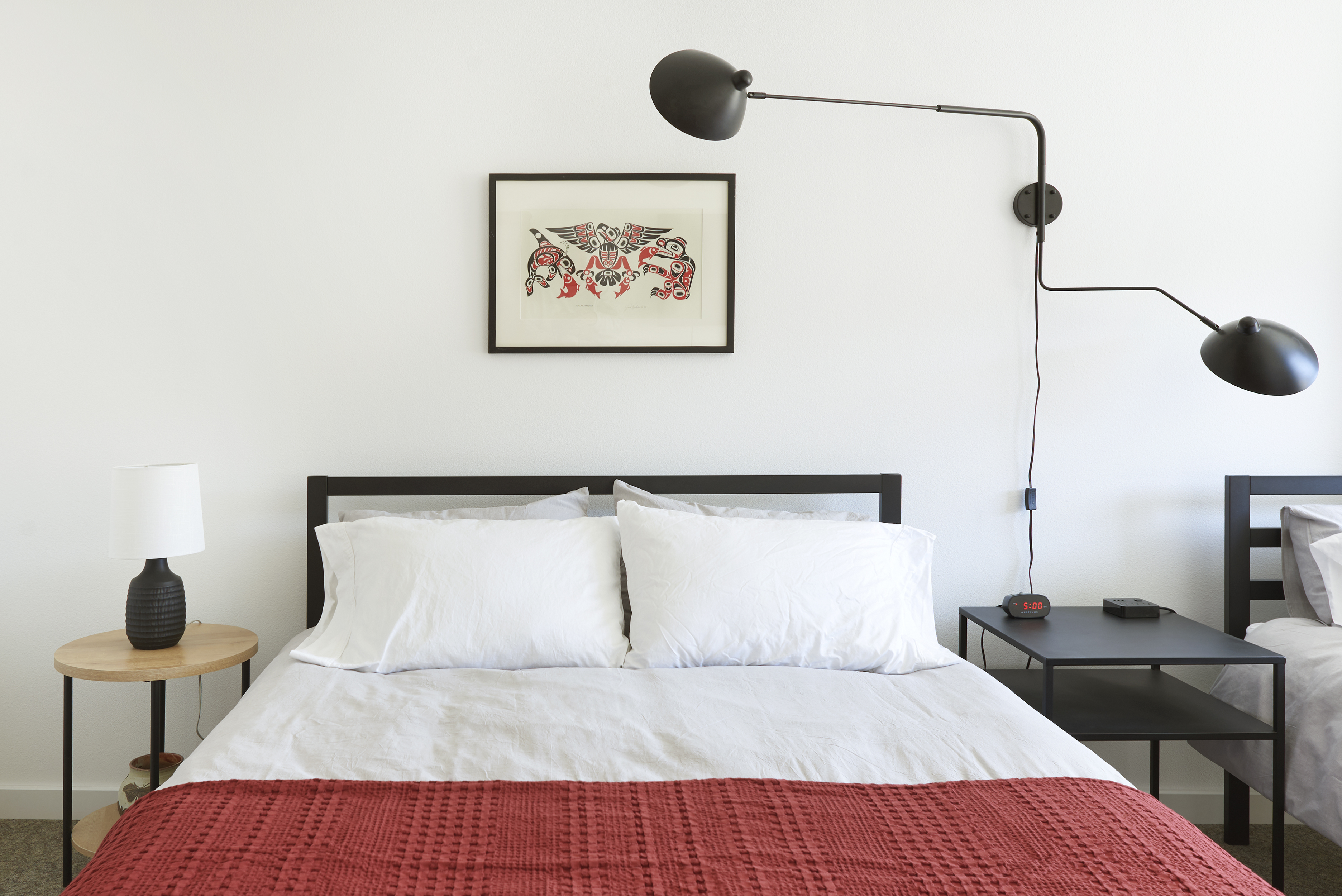 Two queen beds, attached bathroom, full kitchen.