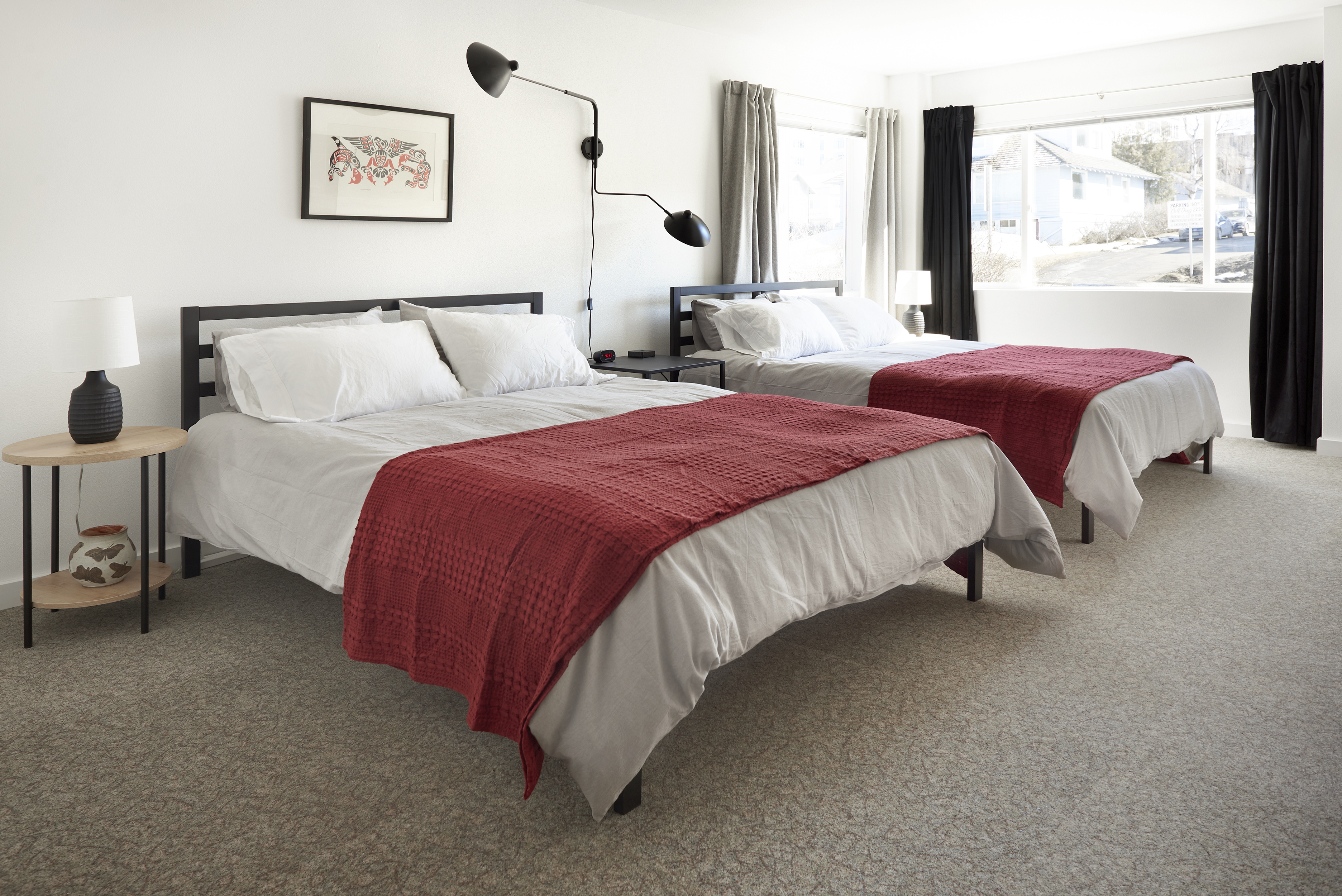 Two queen beds, attached bathroom, full kitchen.