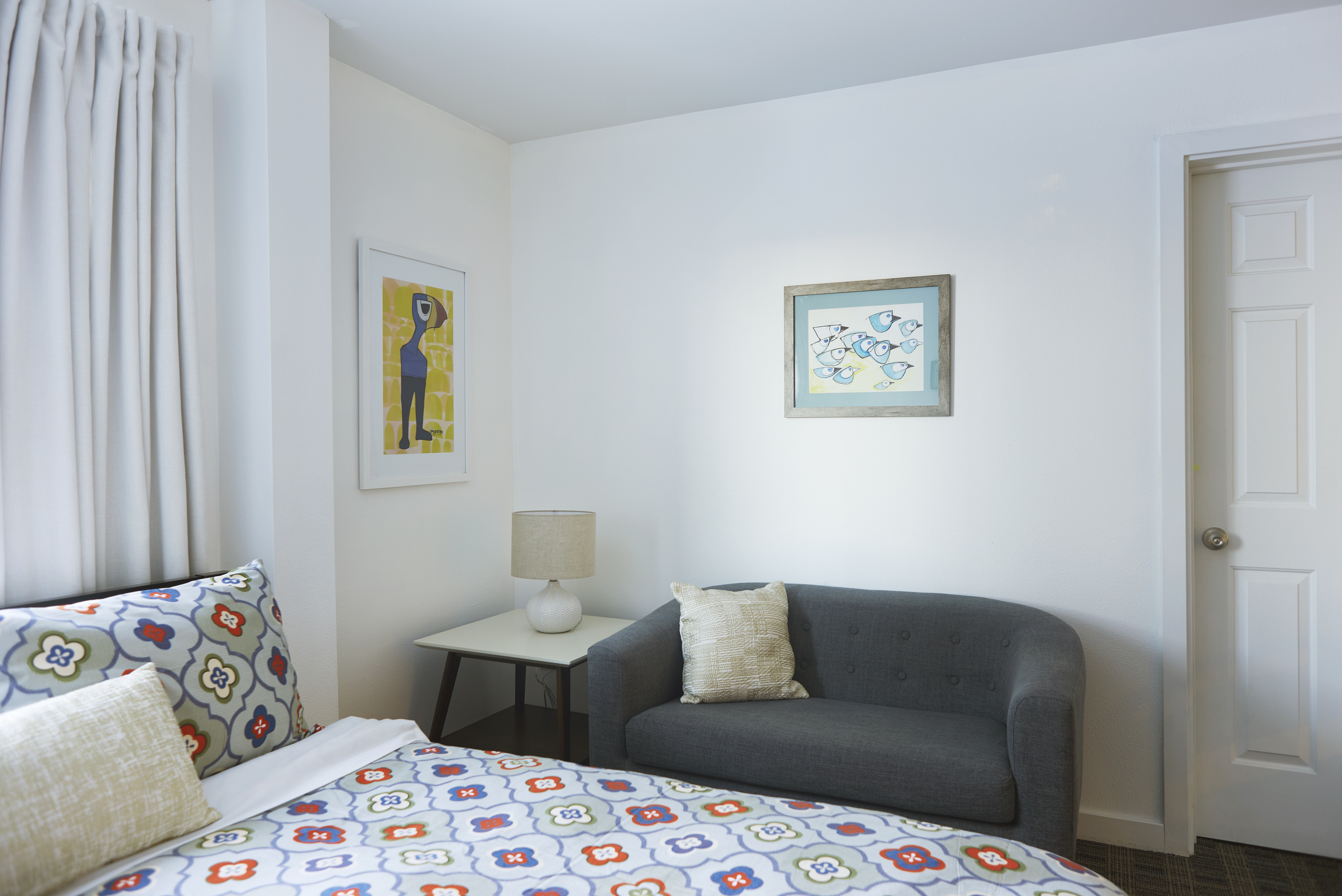 One queen bed and private bathroom in the Magpie Room at Snob Hollow Inn.