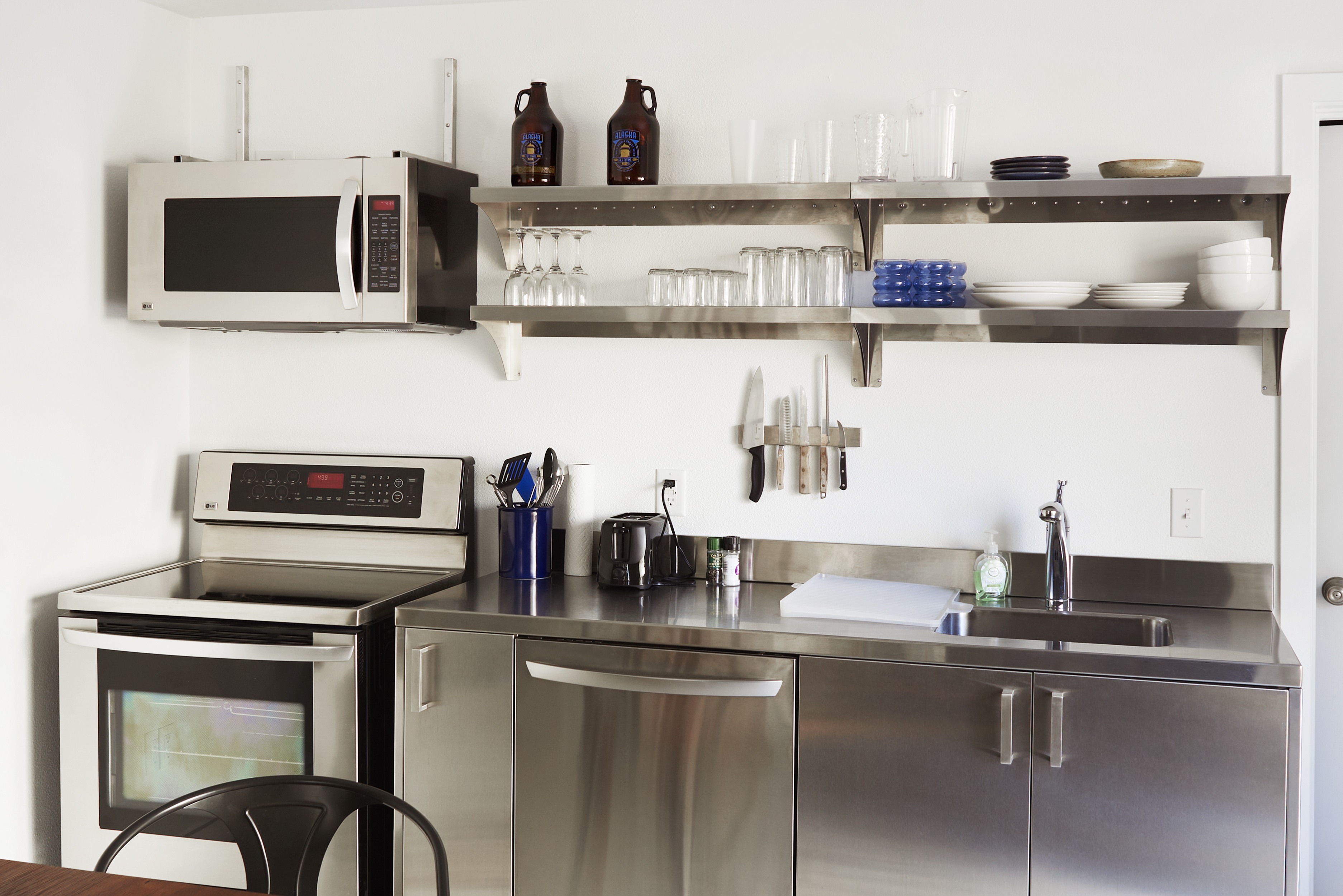 Two queen beds, attached bathroom, full kitchen.