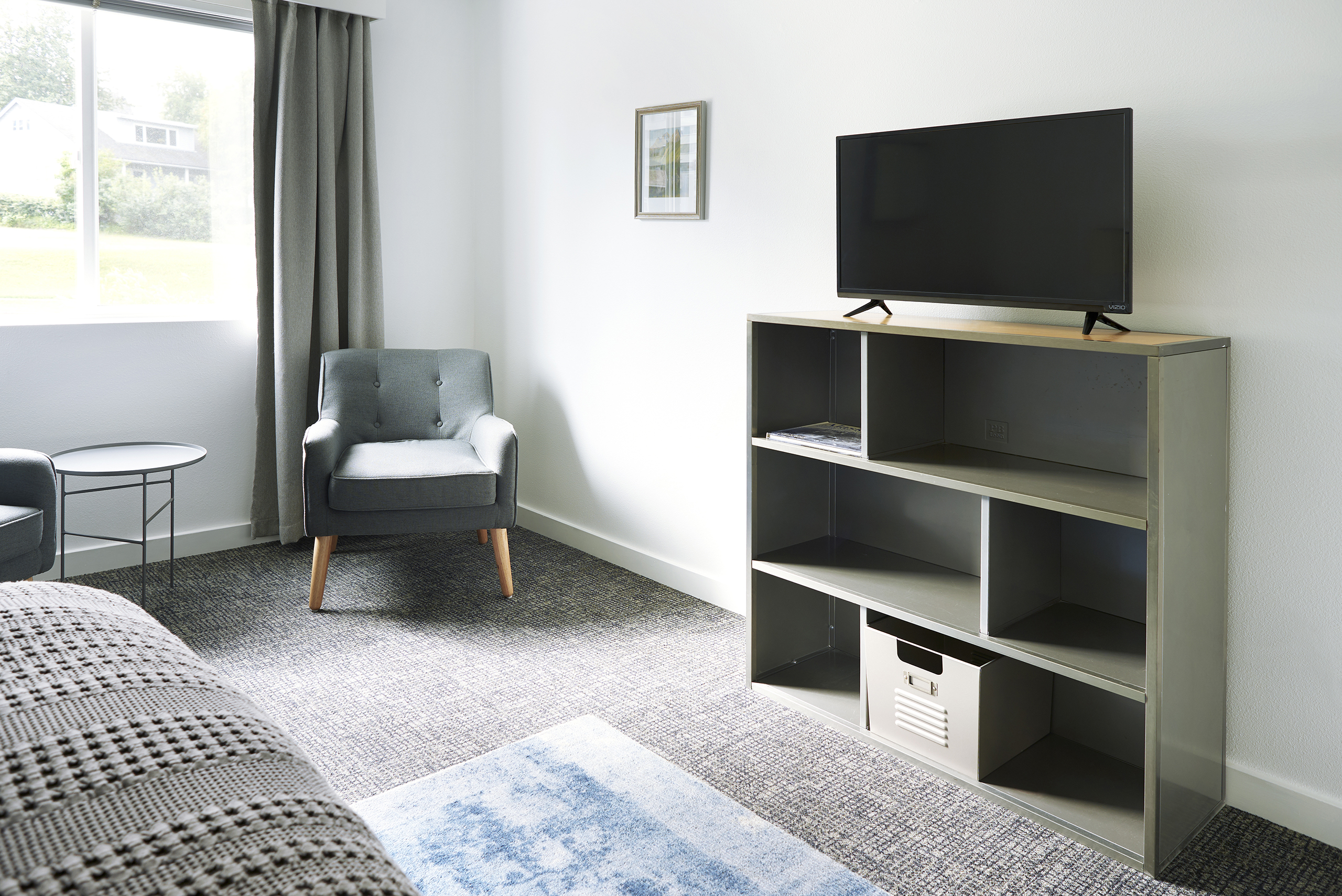 Queen bed with shared bathroom