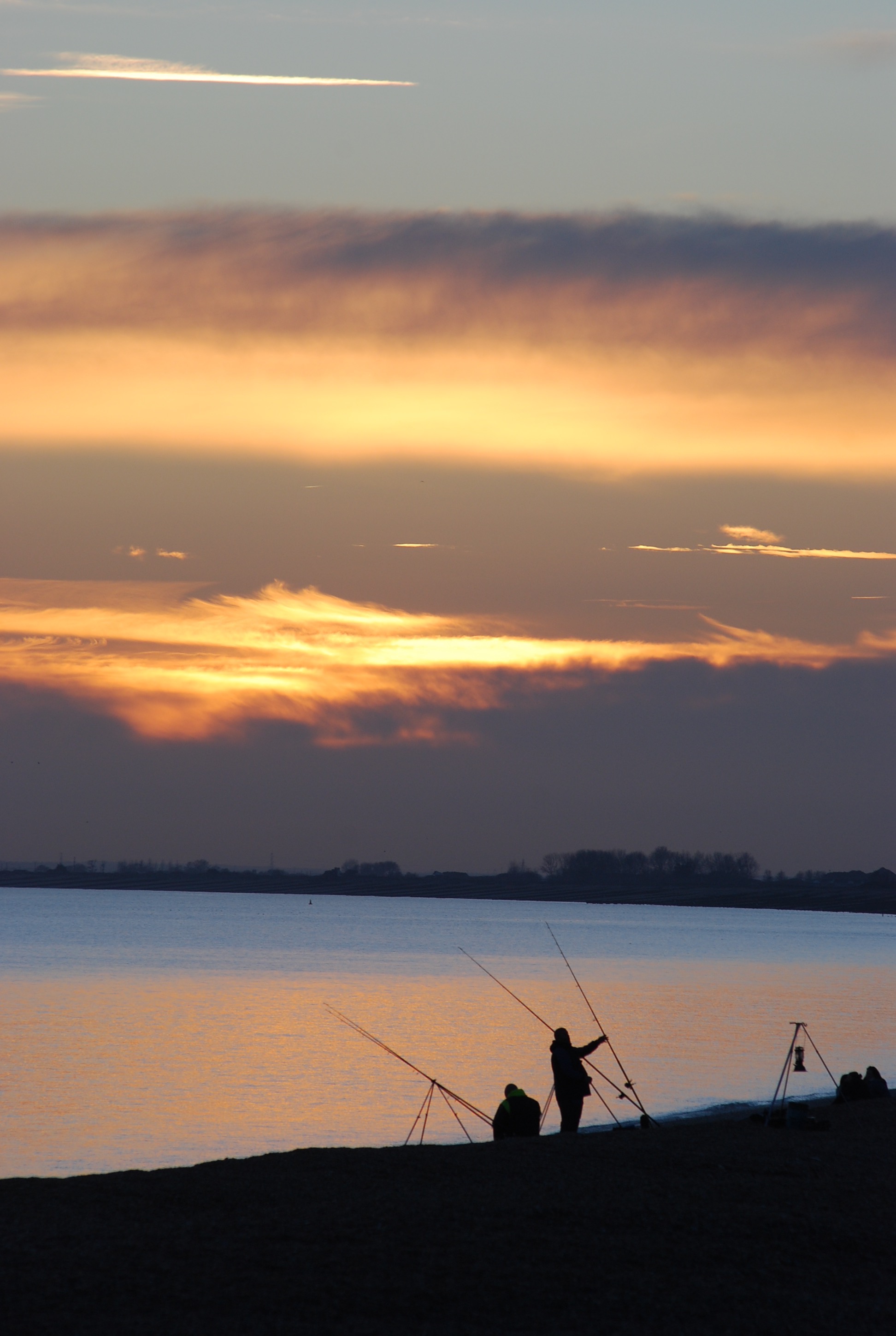 Fishermen at sunset