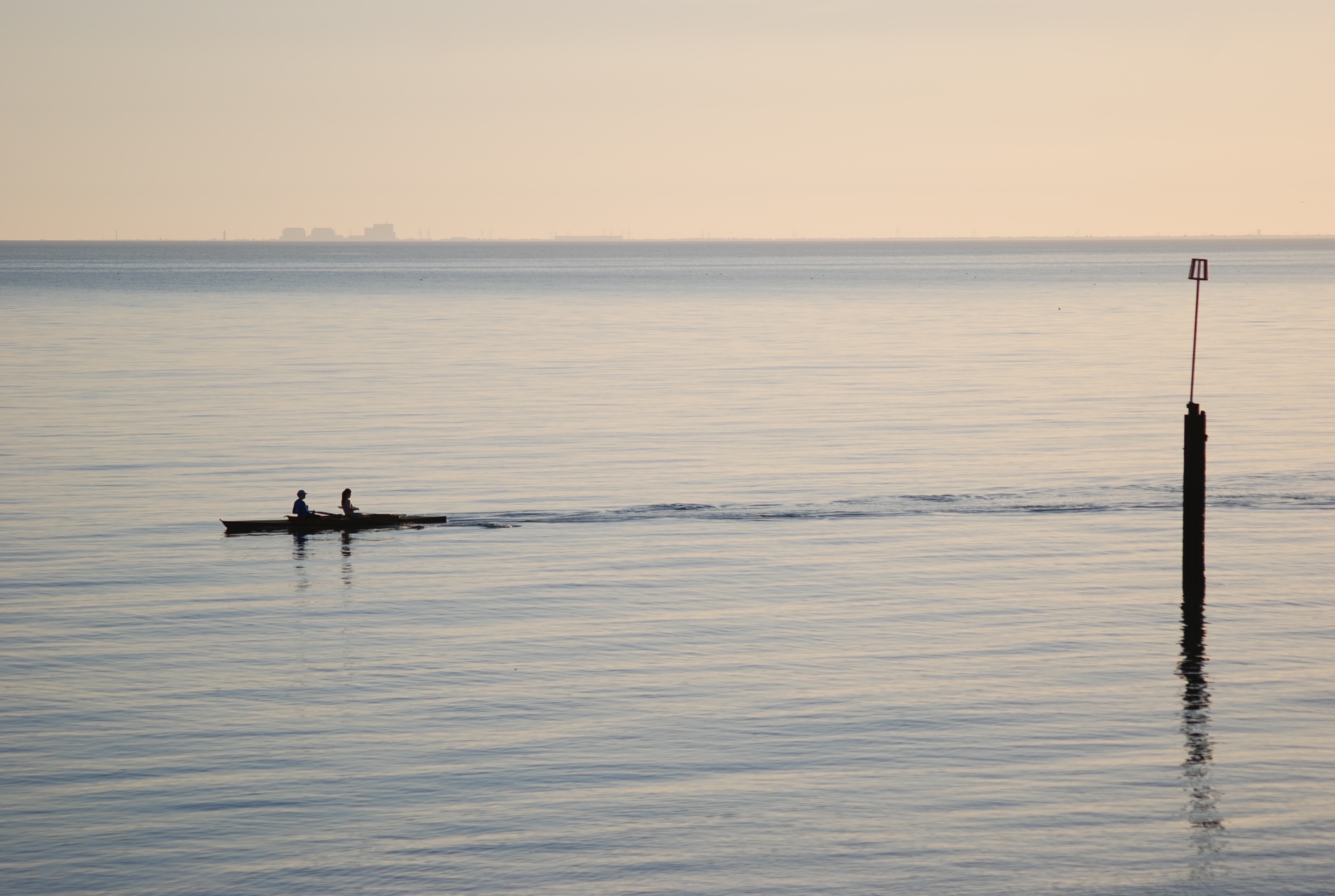 Canoists on the sea, stunning calm day