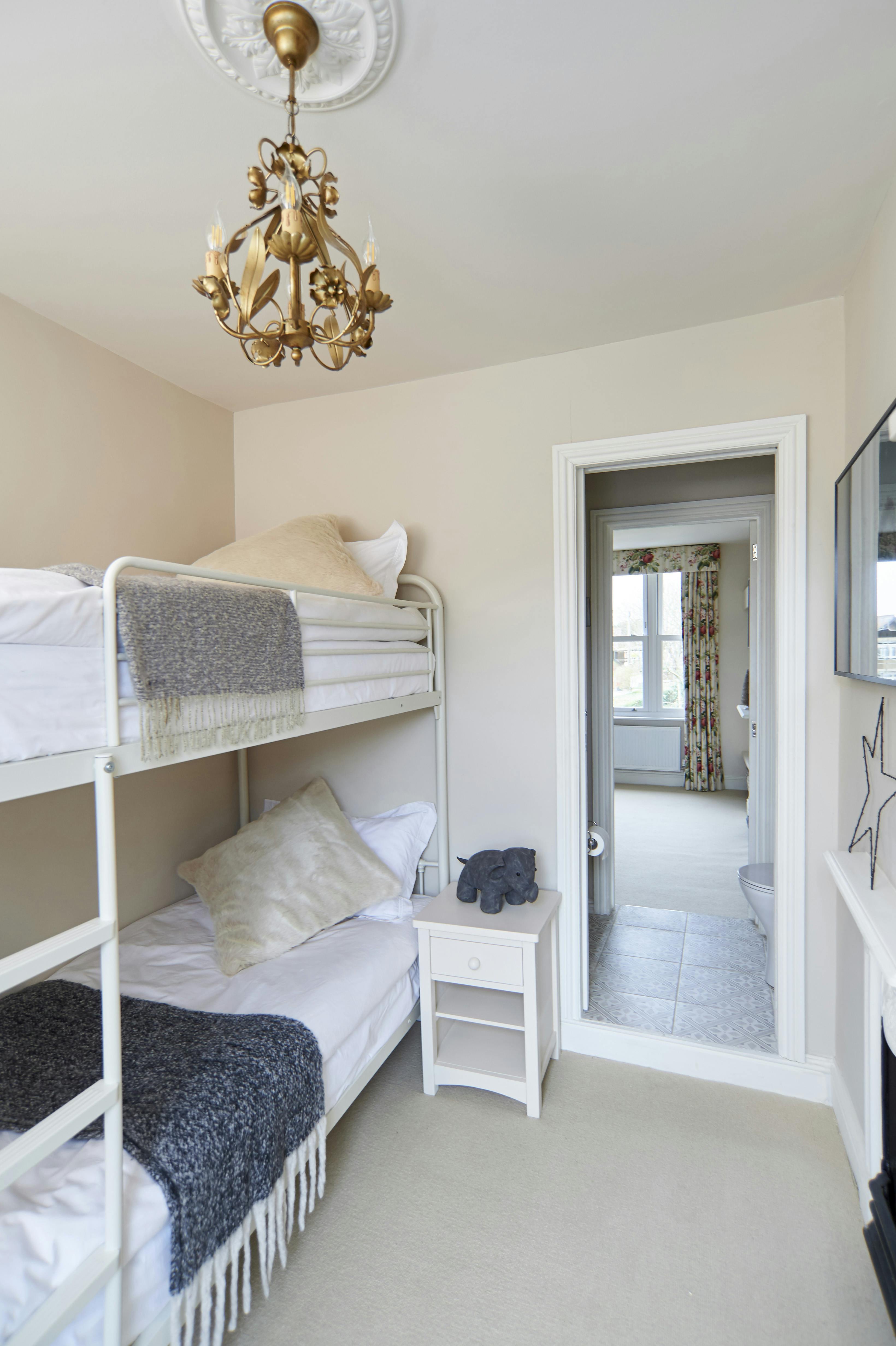 Bunk Room Beds and sidetable through to Jack and Jill ensuite linking to Master Bedroom