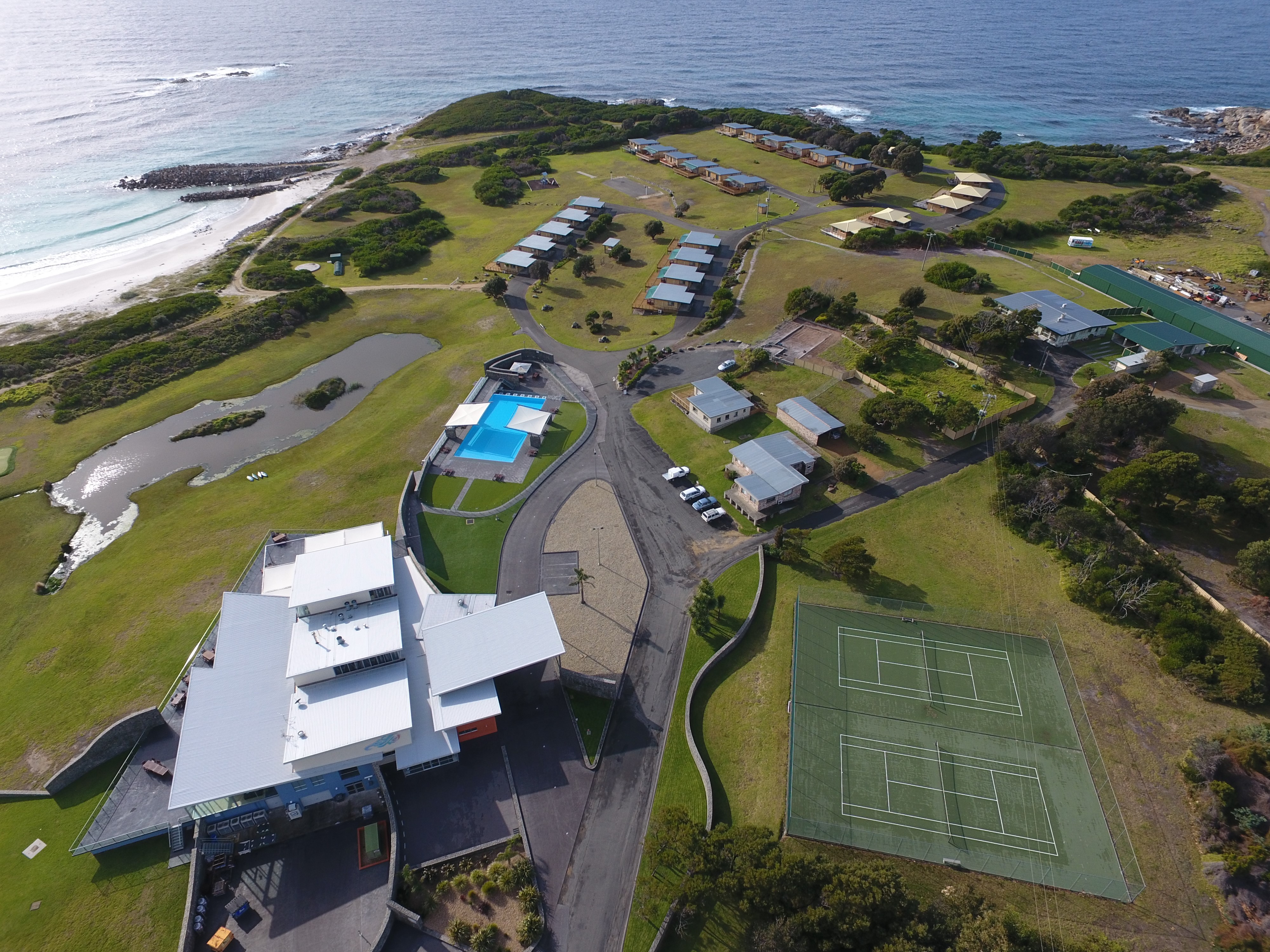 Aerial view of White Sands Estate resort and beachfront accommodation