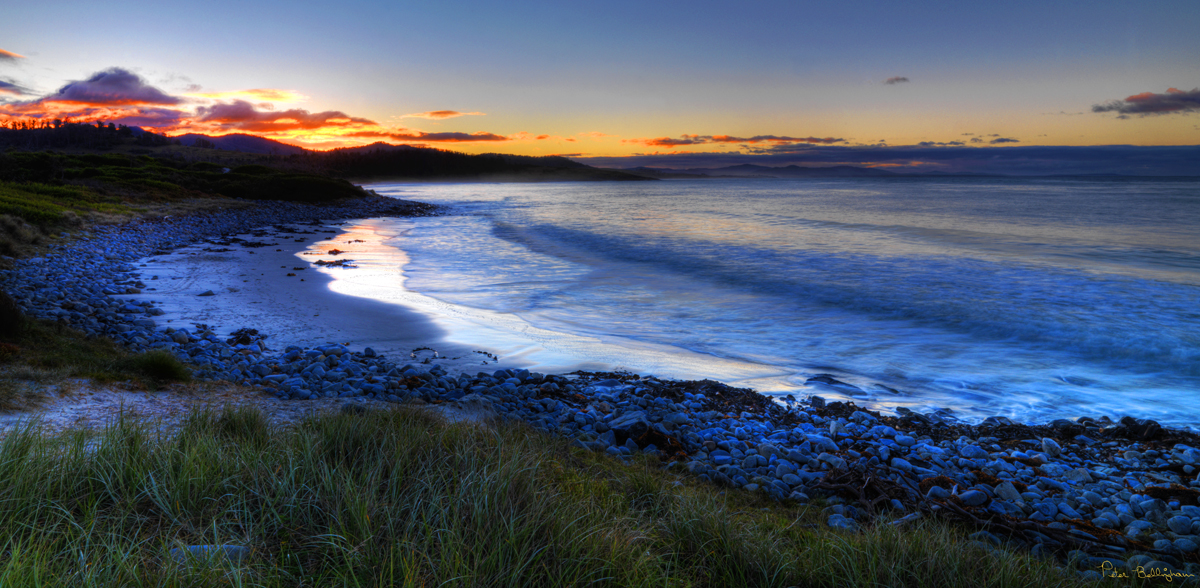 Sunset over the beach at White Sands Estate, East Coast Tasmania