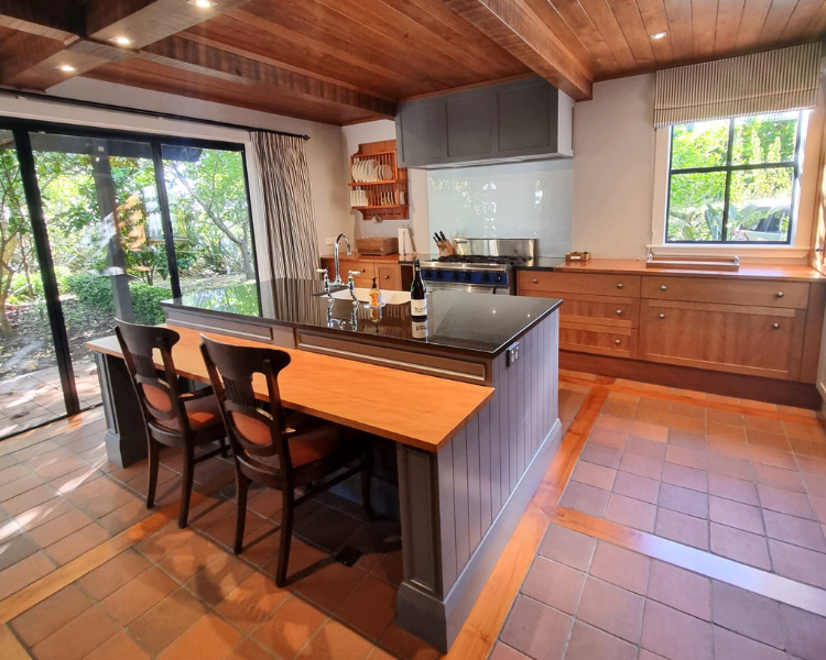 Large open plan kitchen with island bench - The Barn, 970 Lonely Bay Lodge