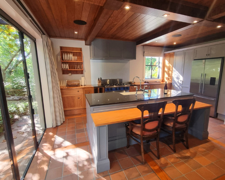 Spacious kitchen with barstool seating - The Barn, 970 Lonely Bay Lodge