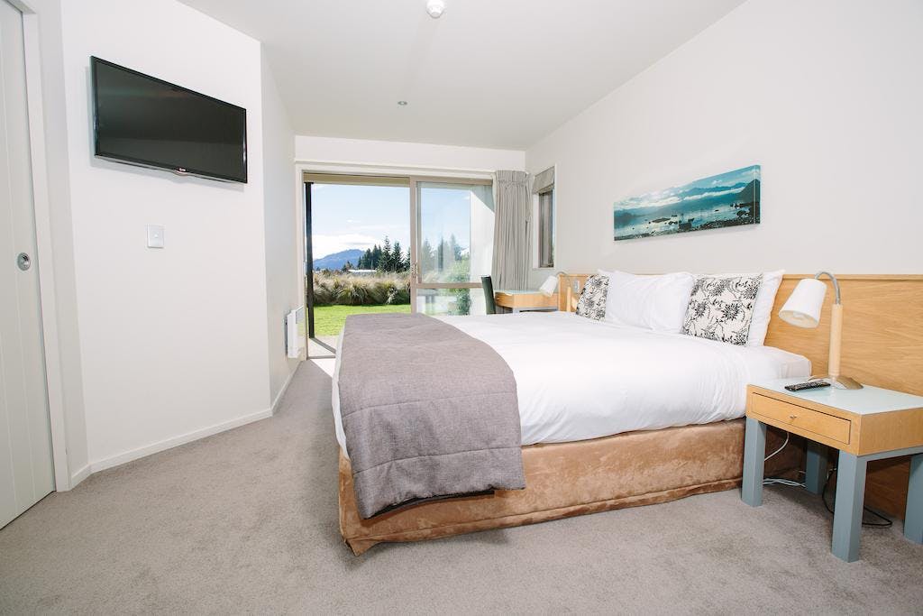 Bright and airy 1 bedroom apartment at Oakridge Resort, with large windows that offer stunning views of the surrounding mount