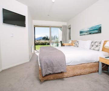 Bright and airy 1 bedroom apartment at Oakridge Resort, with large windows that offer stunning views of the surrounding mount