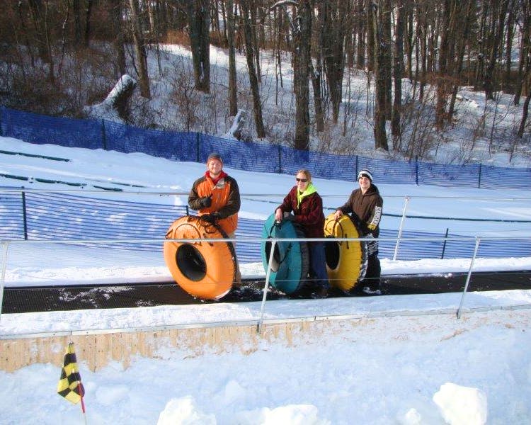 Enjoy thrilling outdoor adventure in the snow in the mountains at Pocono Mountain Villas at White Lightning Tubing.