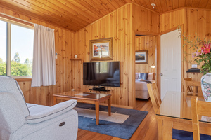 Chalet contains 55" TV as well as twin electric recliners