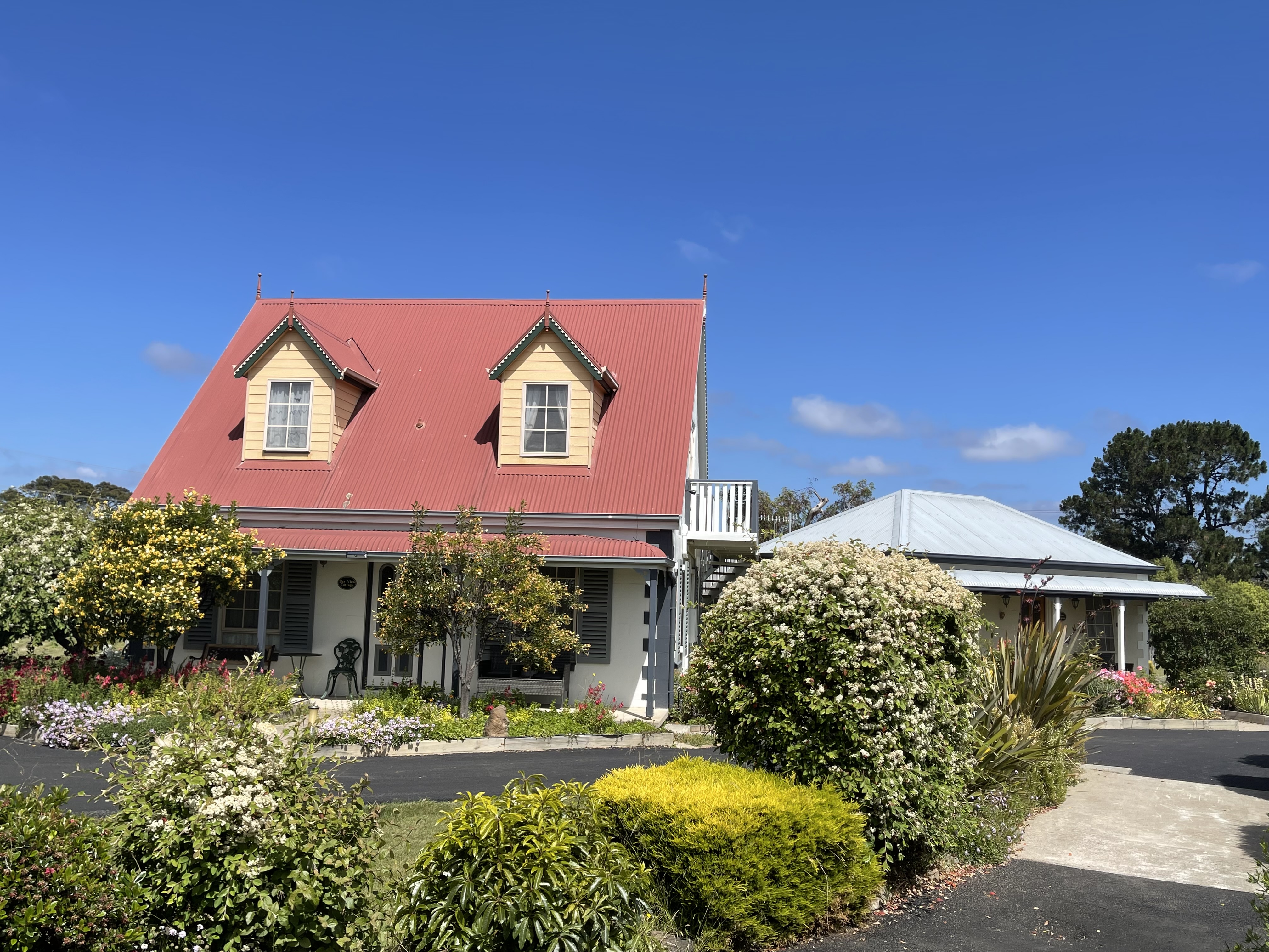 Bayview 3 bedroom Attic Cottage and Dove 2 bedroom Cottage to the right.