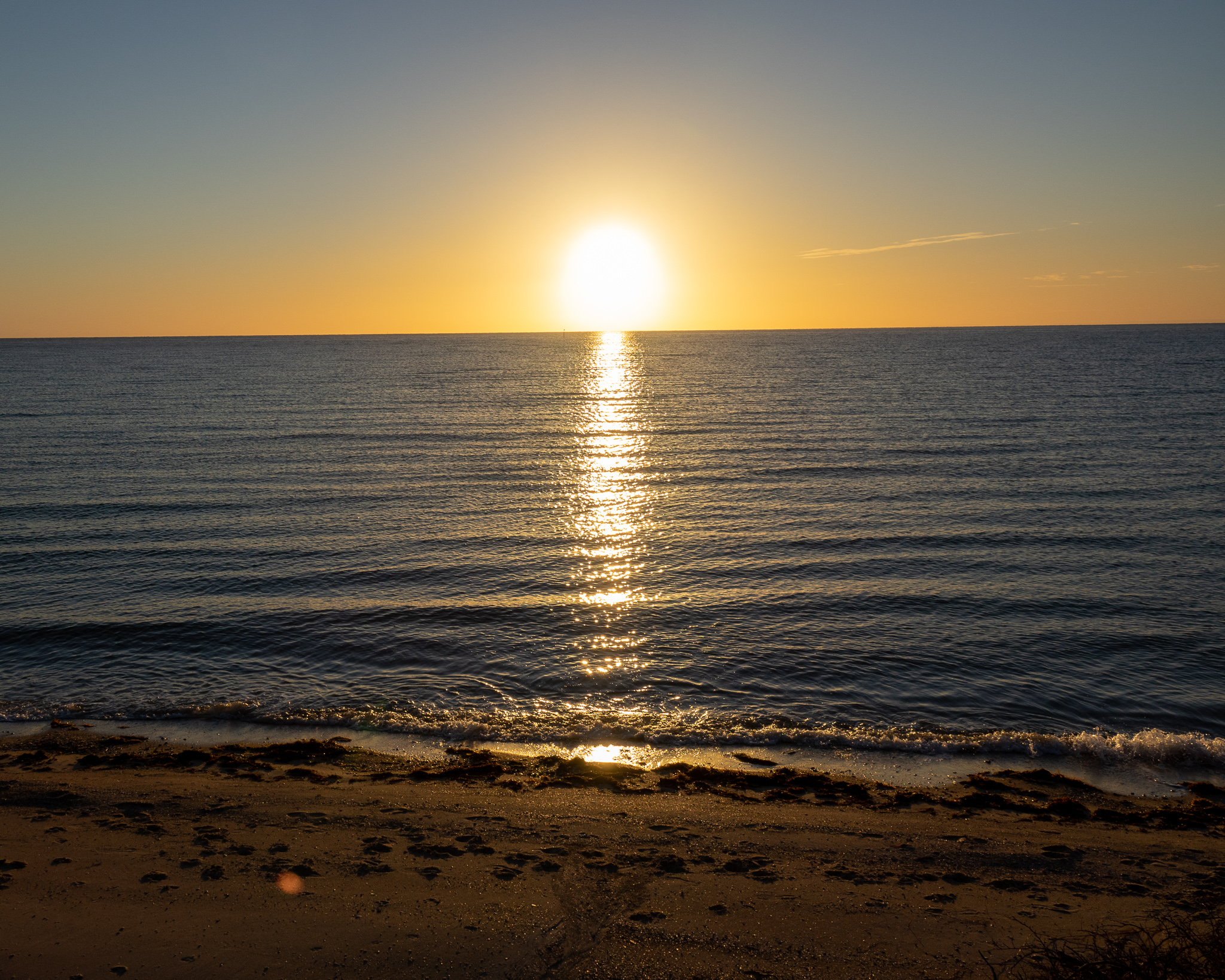Light streaming across the water during a lovely Port Vincent sunrise