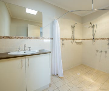 King studio suite bathroom at Port Vincent Motel and Apartments
