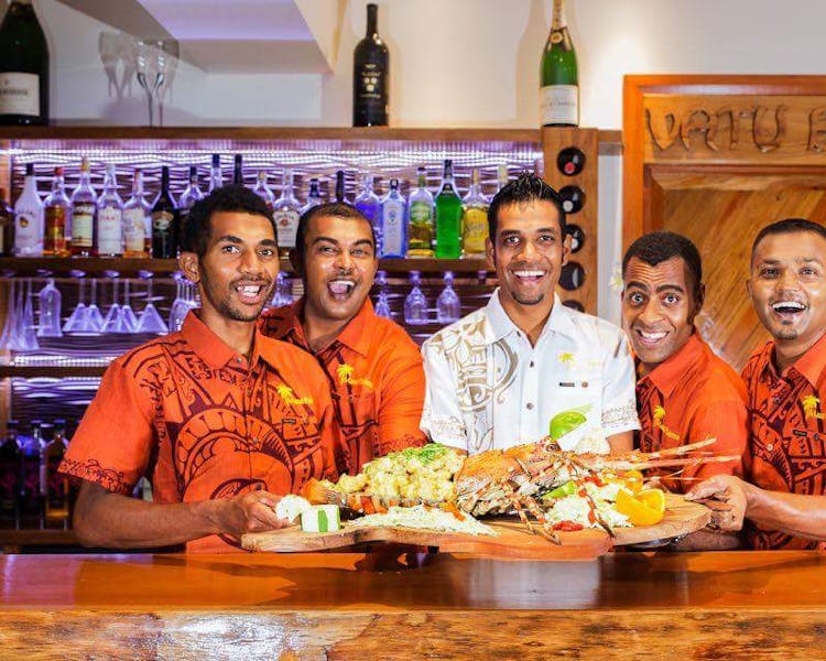 beachfront boutique hotel coral coast fiji fine dining seafood platter lobster staff