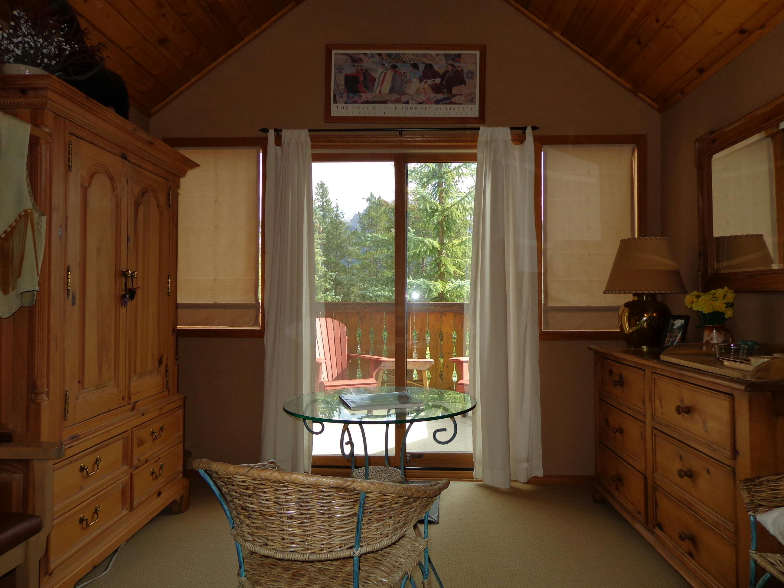 Spacious Mountain View suite includes dressing area and private balcony