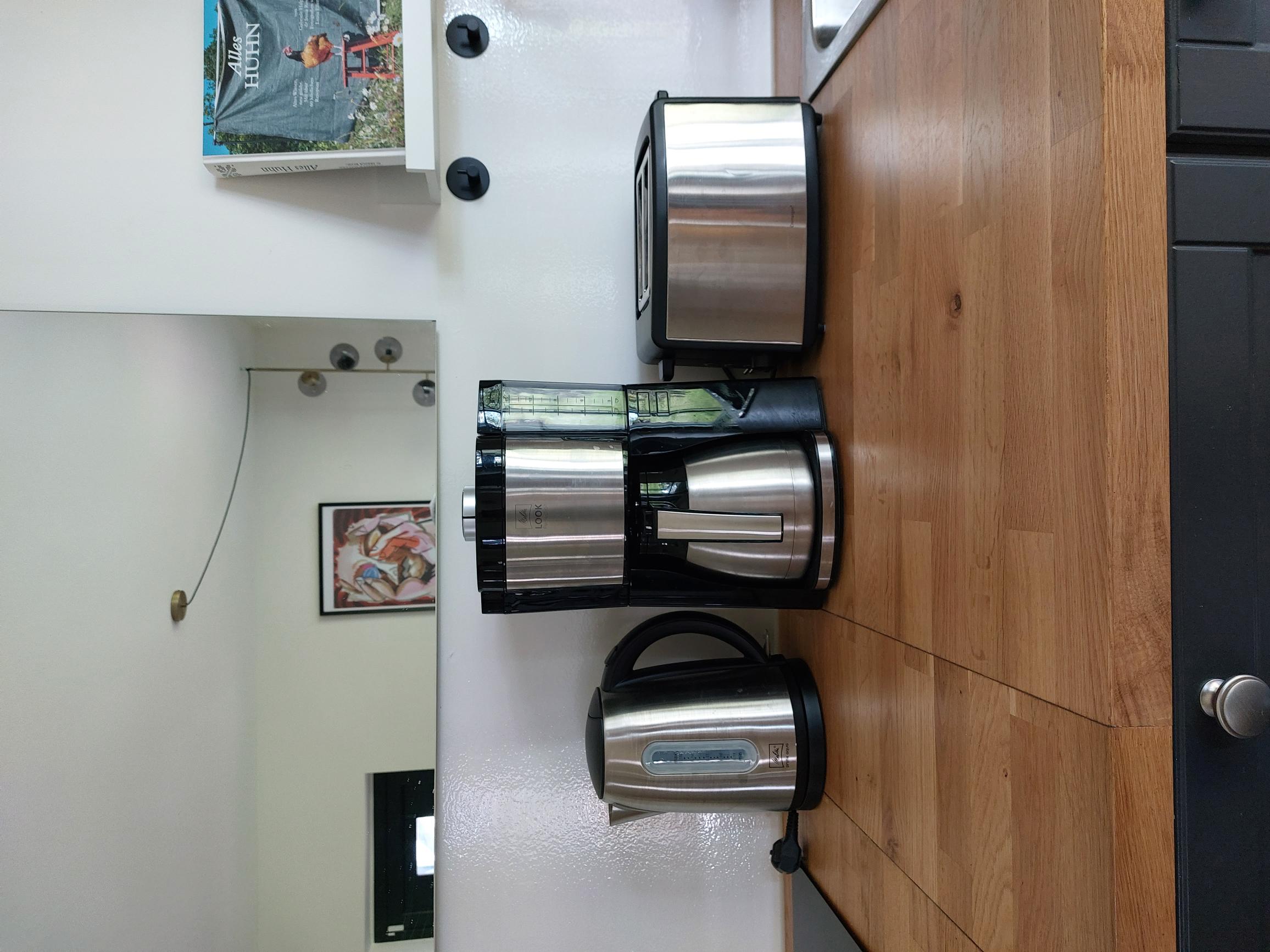 Apple Studio kitchen amenities: toaster, electric kettle and coffee maker.