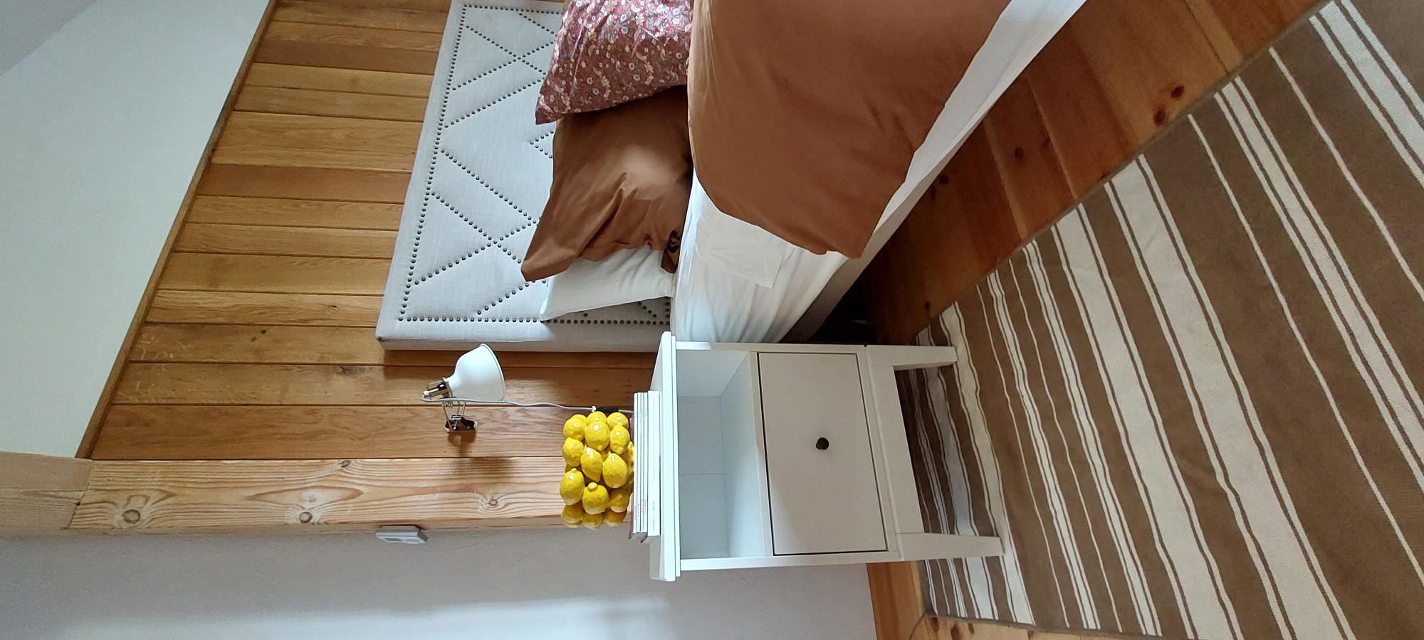 Oak Studio bedroom with bedside tables for extra storage