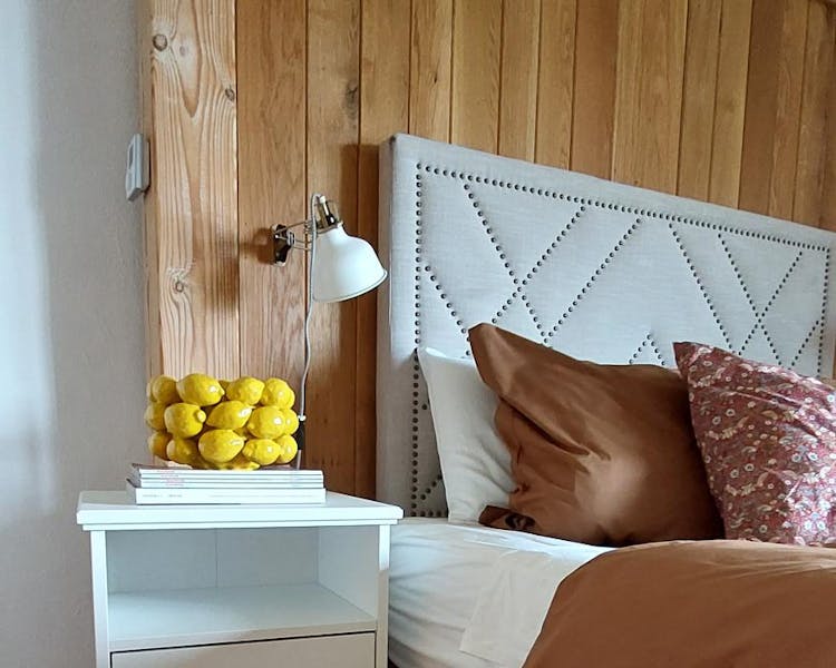 Oak Studio bedroom with bedside tables for extra storage