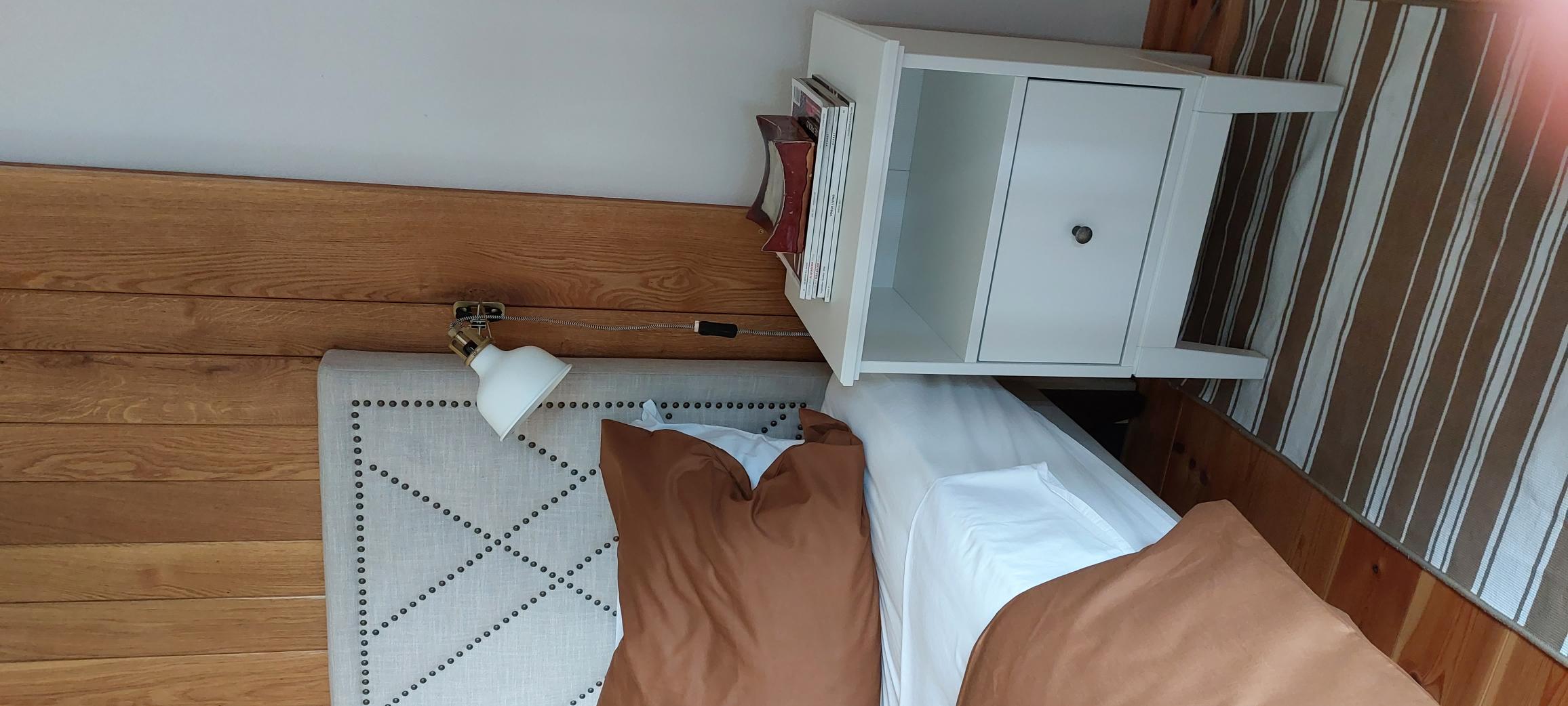 Oak Studio bedroom with bedside tables for extra storage